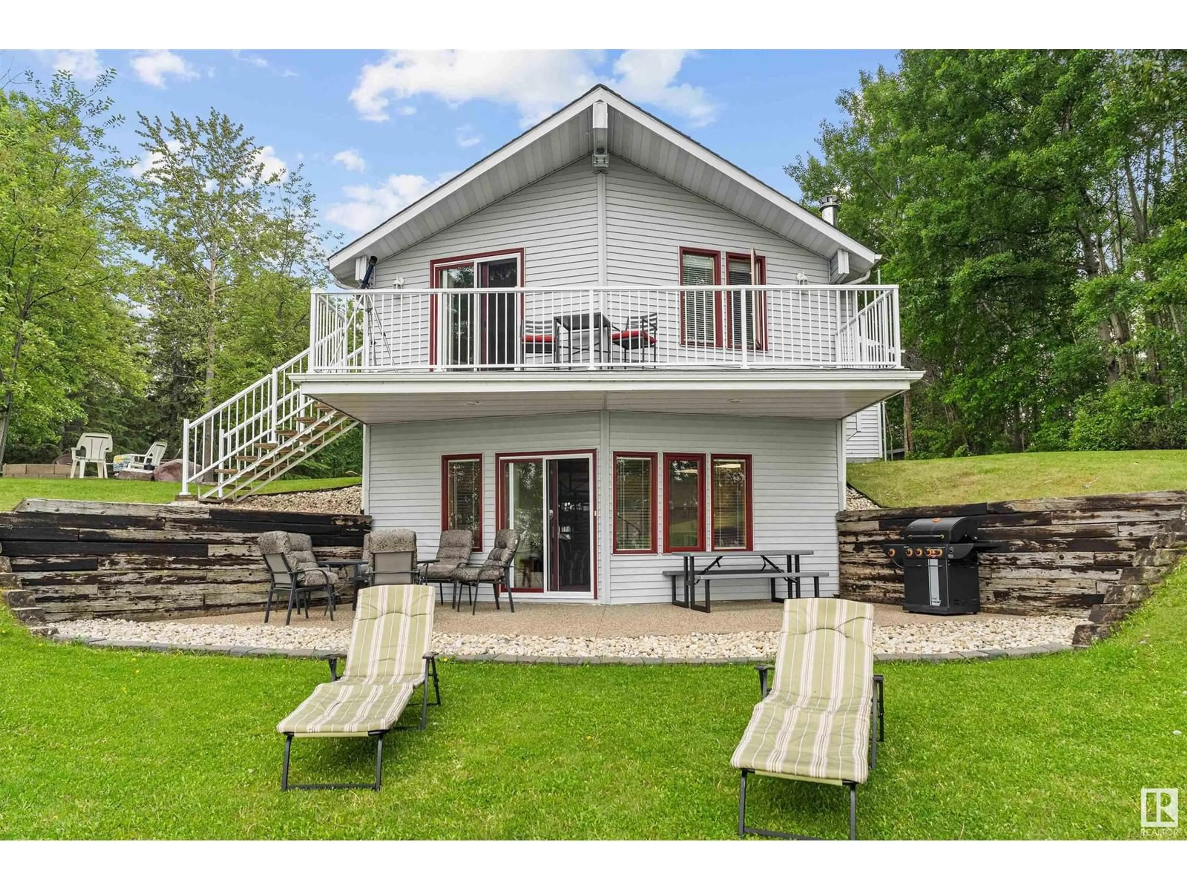 Home with vinyl exterior material, water/lake/river/ocean view for 20 2120 TWP ROAD 565, Rural Lac Ste. Anne County Alberta T0E1V0
