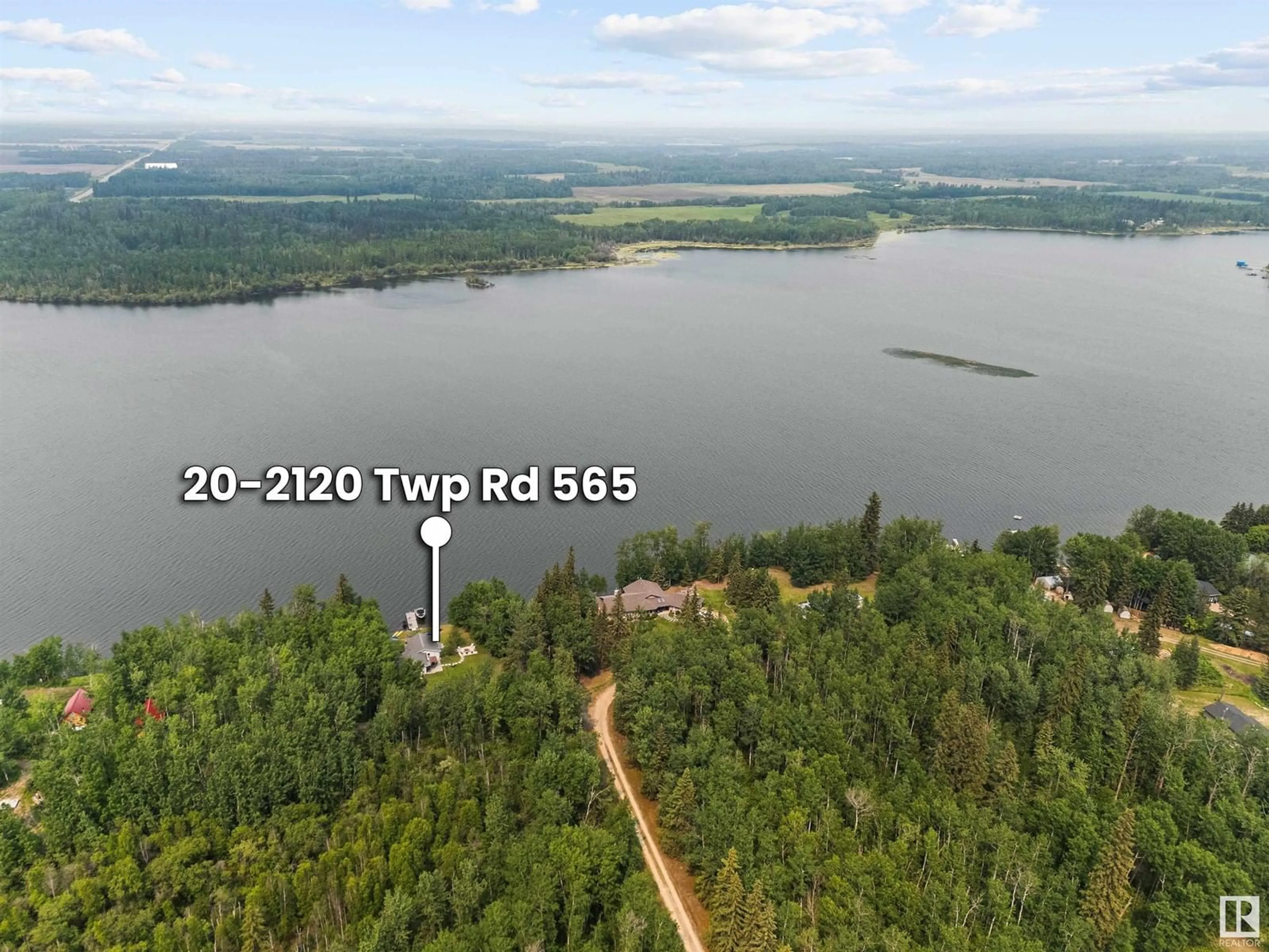 A pic from outside/outdoor area/front of a property/back of a property/a pic from drone, water/lake/river/ocean view for 20 2120 TWP ROAD 565, Rural Lac Ste. Anne County Alberta T0E1V0
