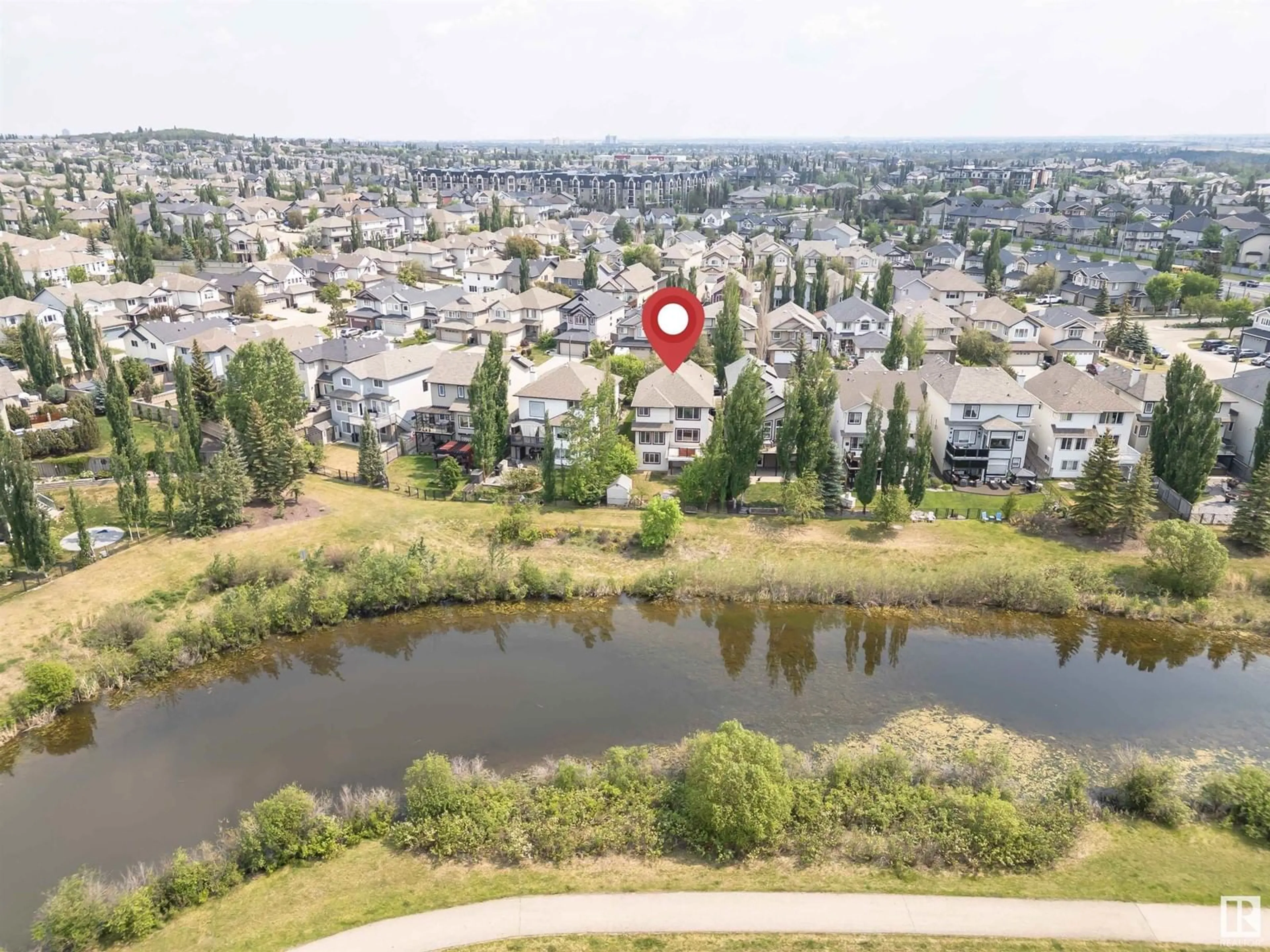 A pic from outside/outdoor area/front of a property/back of a property/a pic from drone, water/lake/river/ocean view for 7363 SINGER WY, Edmonton Alberta T6R3S1