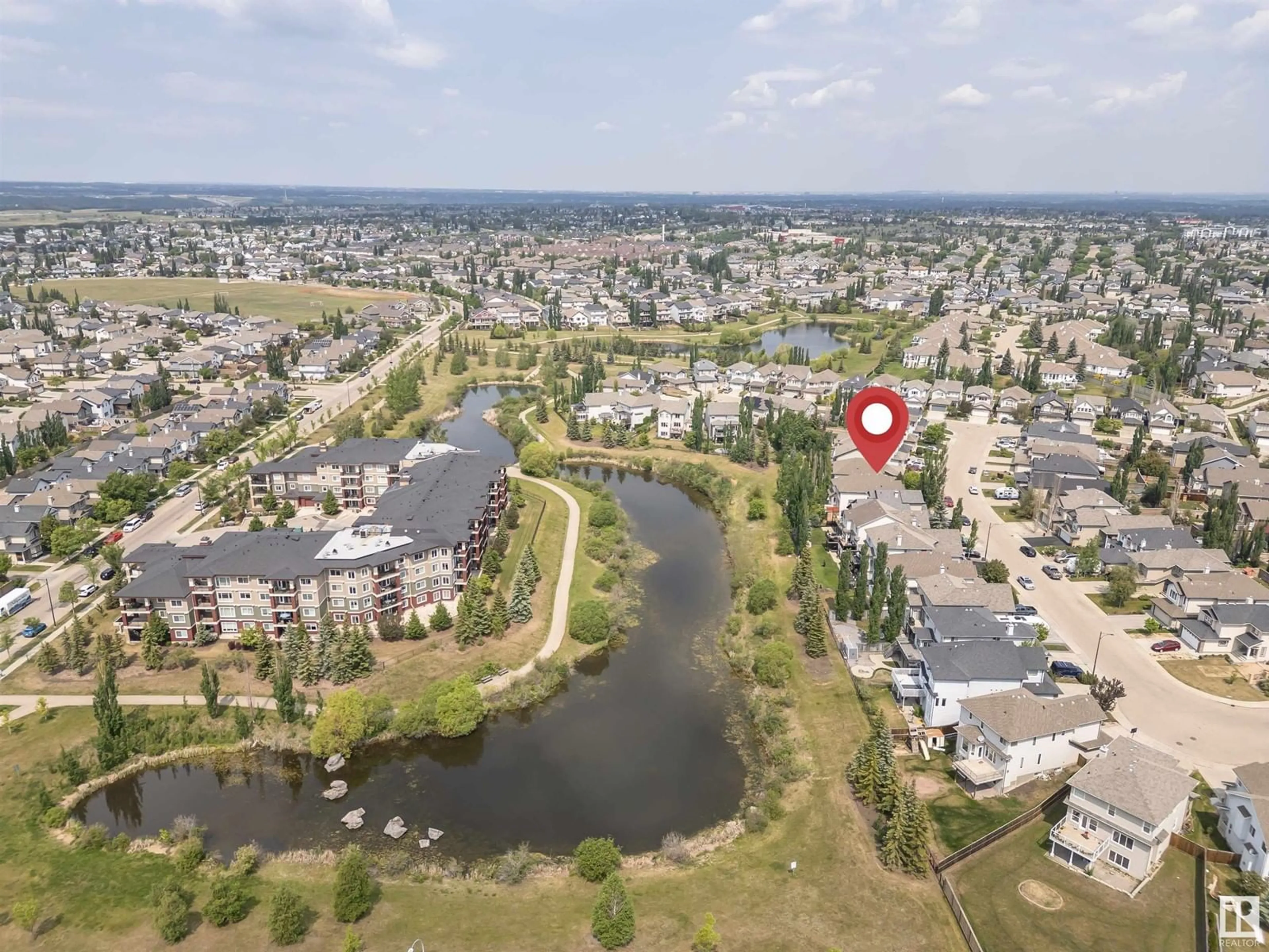 A pic from outside/outdoor area/front of a property/back of a property/a pic from drone, water/lake/river/ocean view for 7363 SINGER WY, Edmonton Alberta T6R3S1