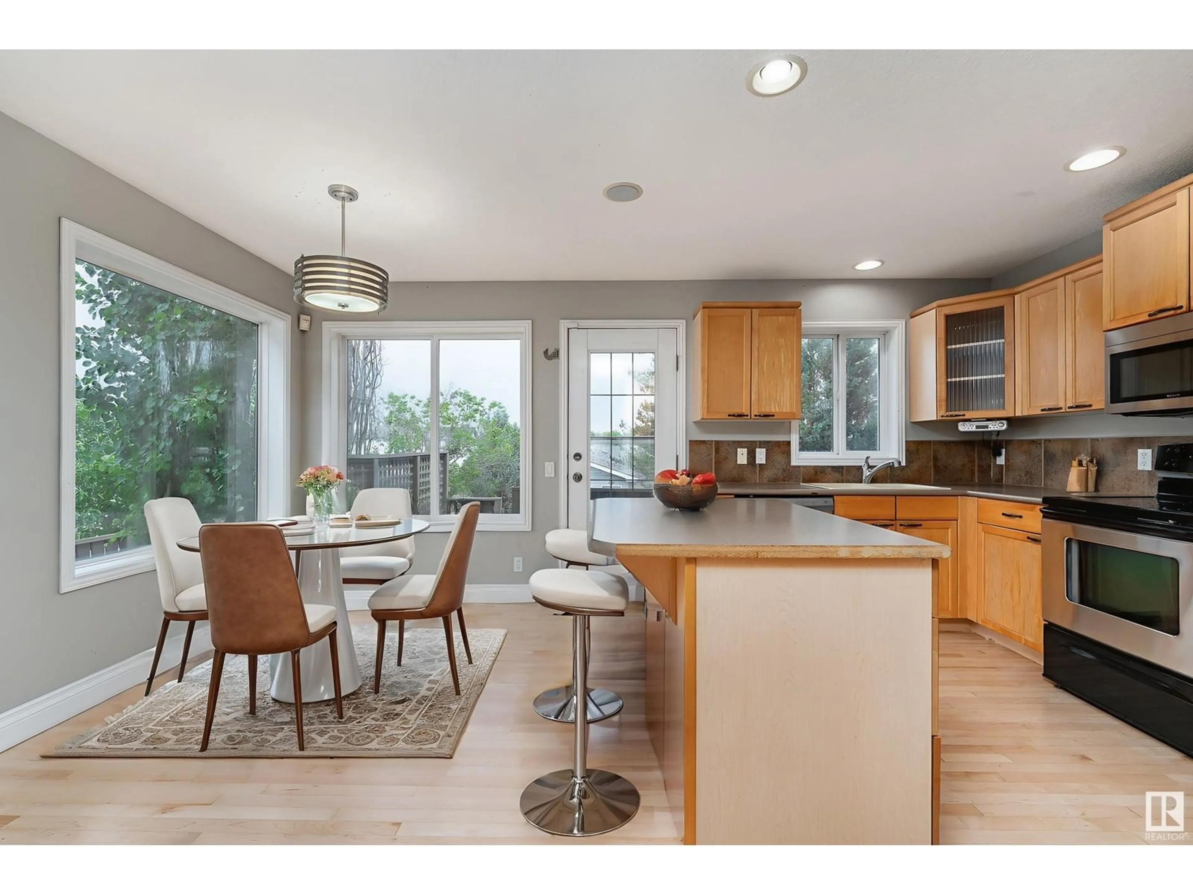 Open concept kitchen, wood/laminate floor for 8 BETHEL DR, Sherwood Park Alberta T8H2G1