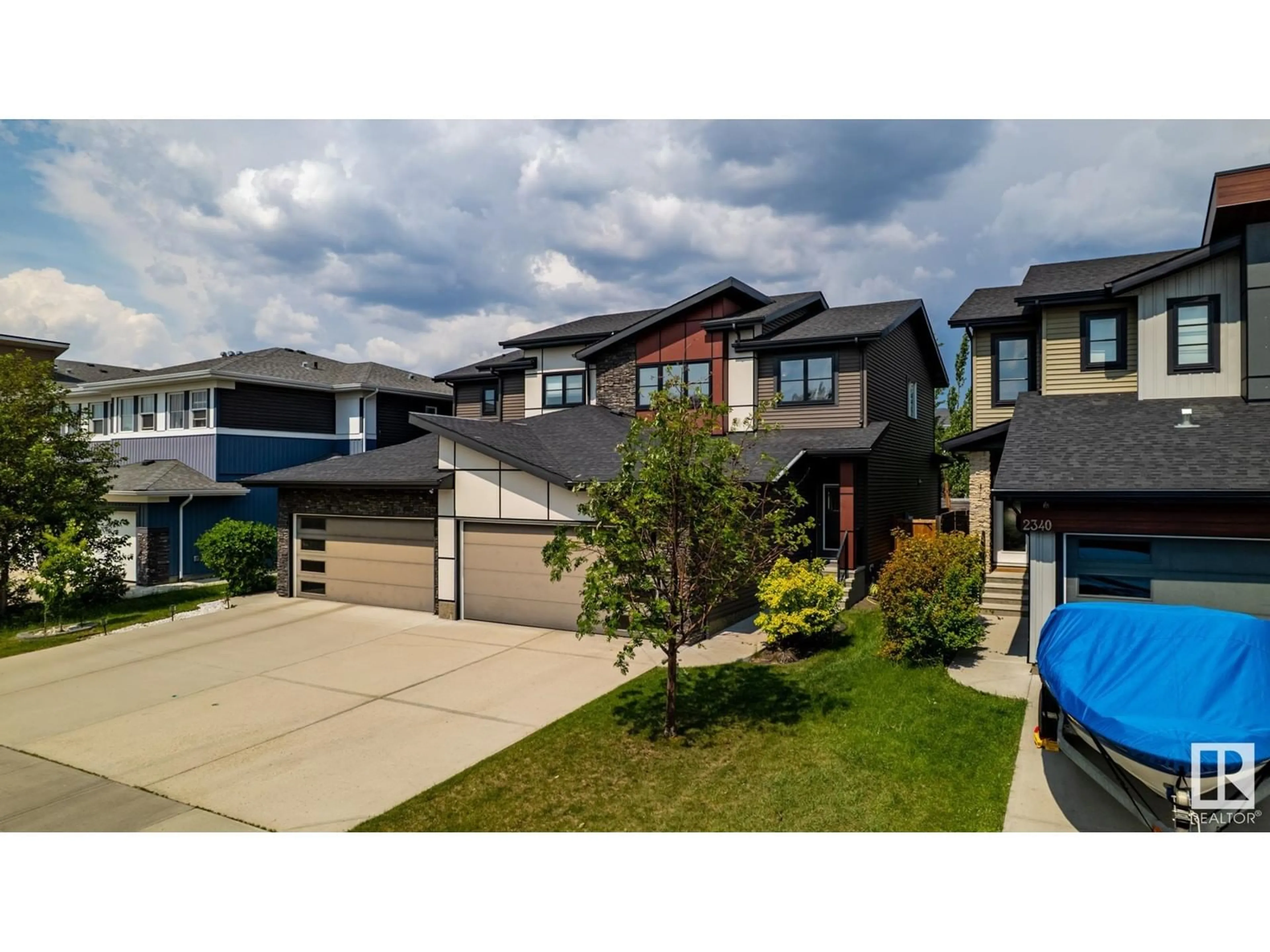 A pic from outside/outdoor area/front of a property/back of a property/a pic from drone, street for 2338 WARE CR, Edmonton Alberta T6W2W5