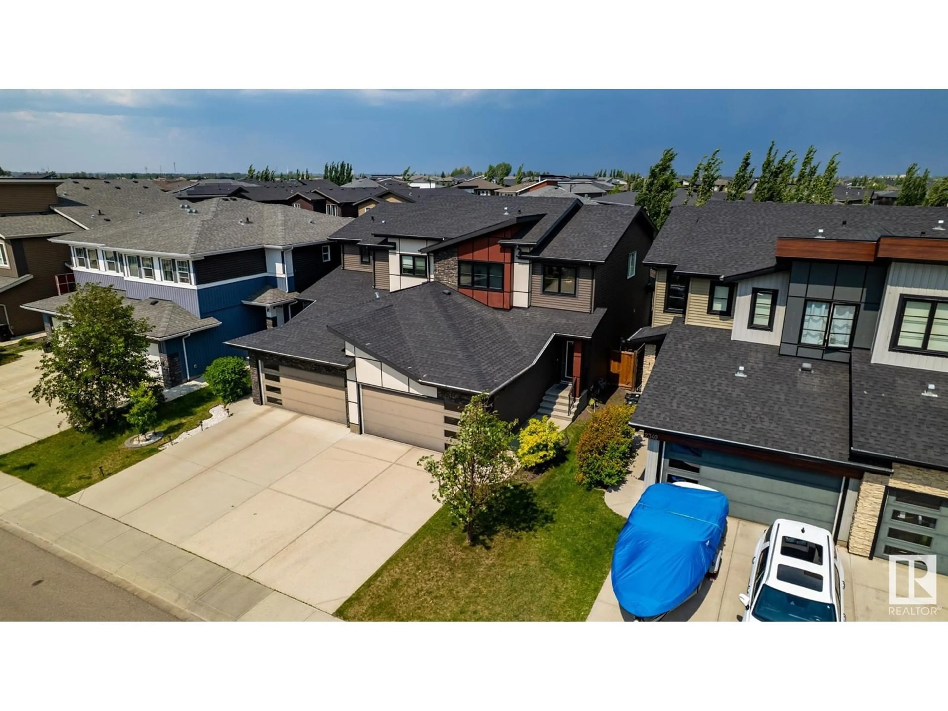 A pic from outside/outdoor area/front of a property/back of a property/a pic from drone, street for 2338 WARE CR, Edmonton Alberta T6W2W5