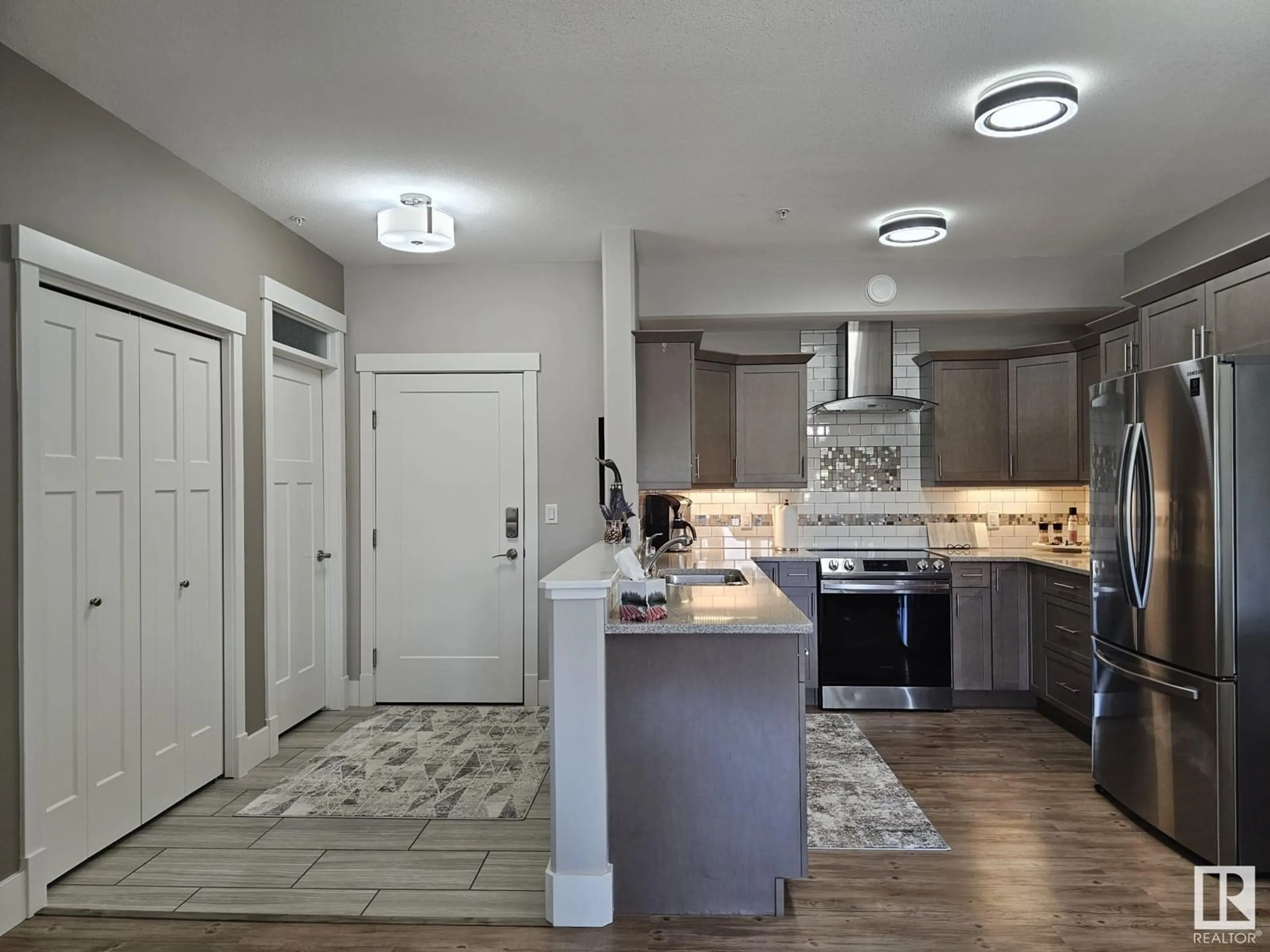 Open concept kitchen, ceramic/tile floor for #204 - 5201 BROUGHAM DR, Drayton Valley Alberta T7A0C8