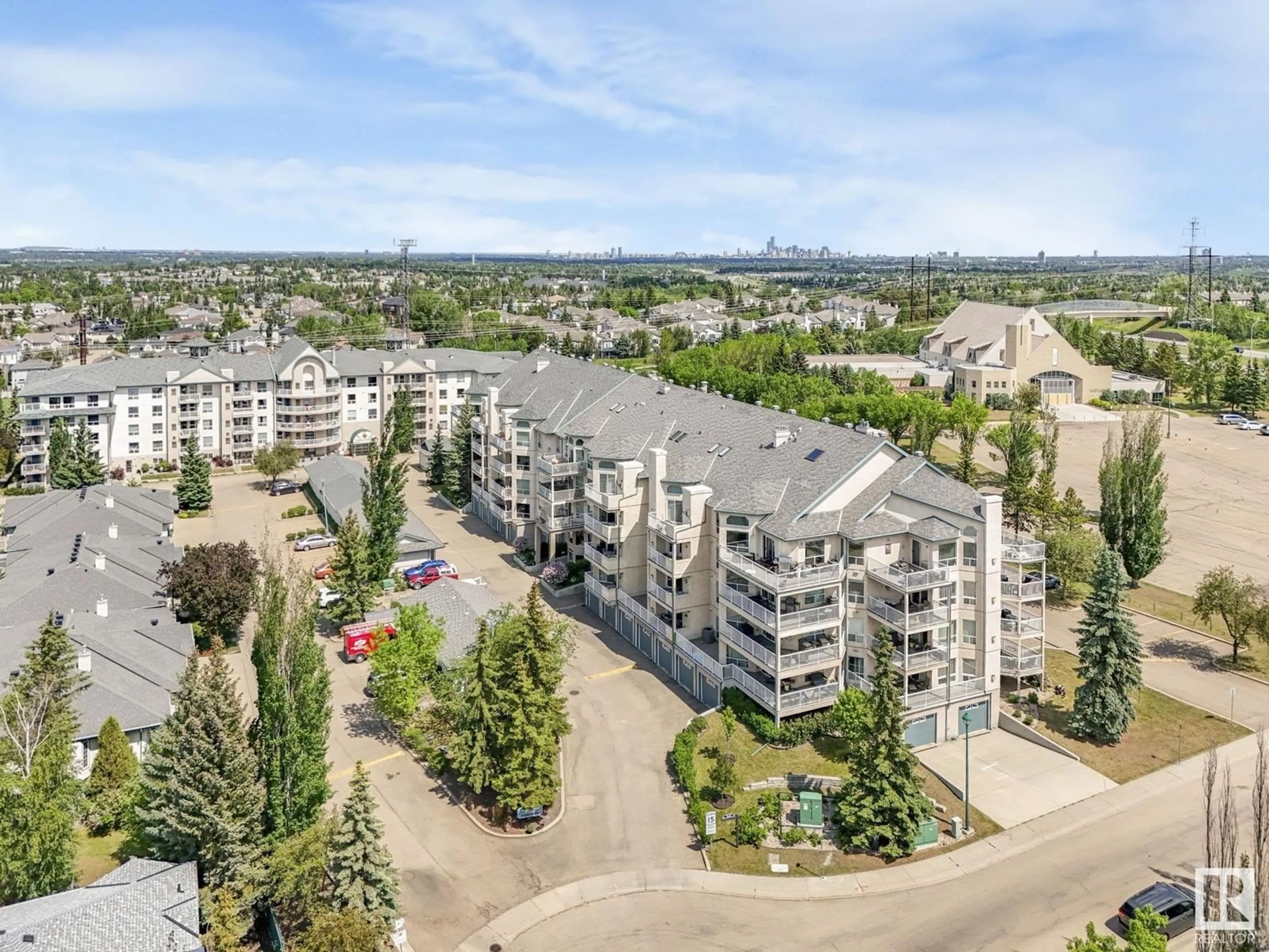 A pic from outside/outdoor area/front of a property/back of a property/a pic from drone, city buildings view from balcony for 309 - 182 HADDOW CL, Edmonton Alberta T6R2V1