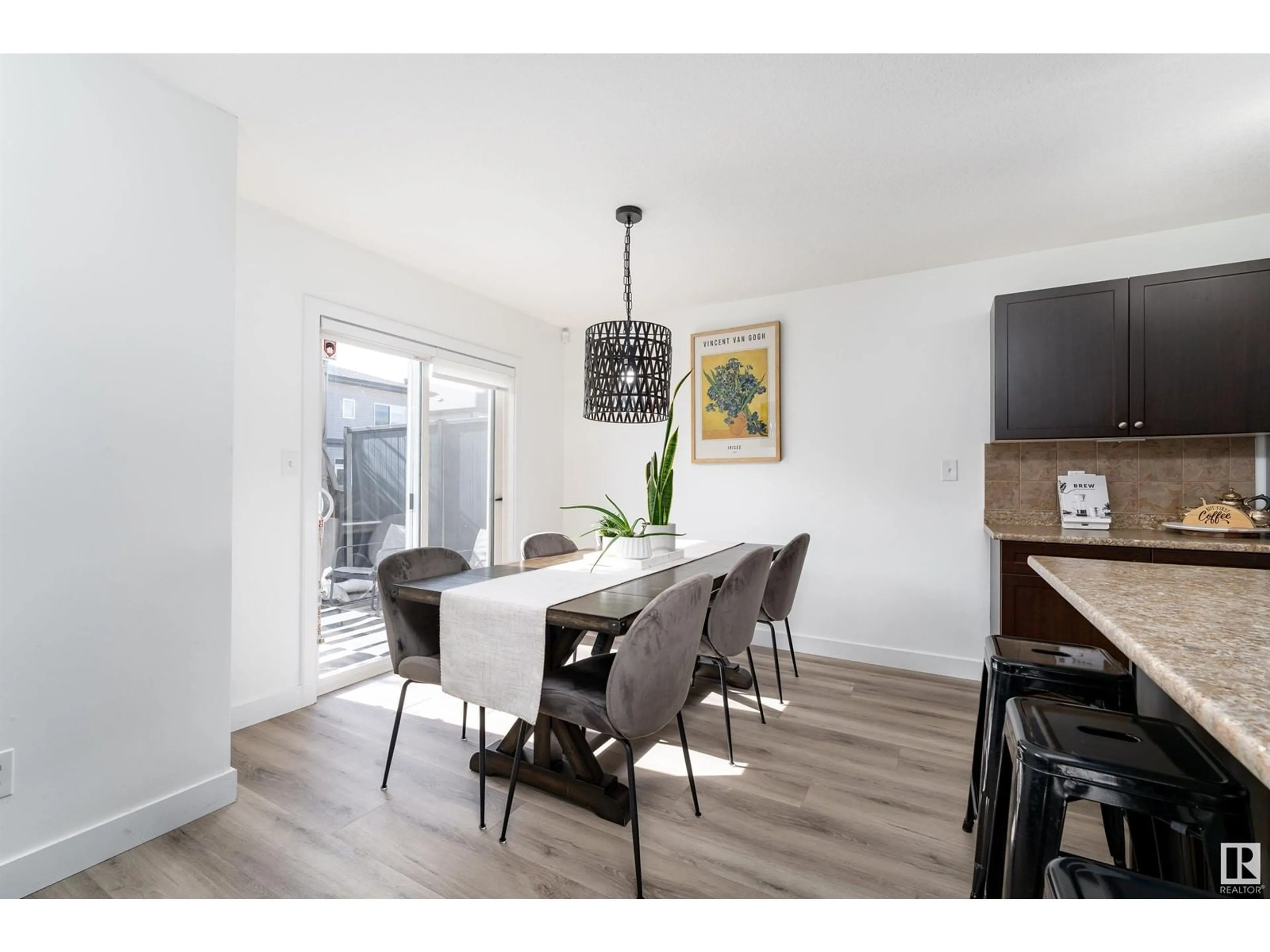 Dining room, wood/laminate floor for 17249 8A AV SW, Edmonton Alberta T6W0M7