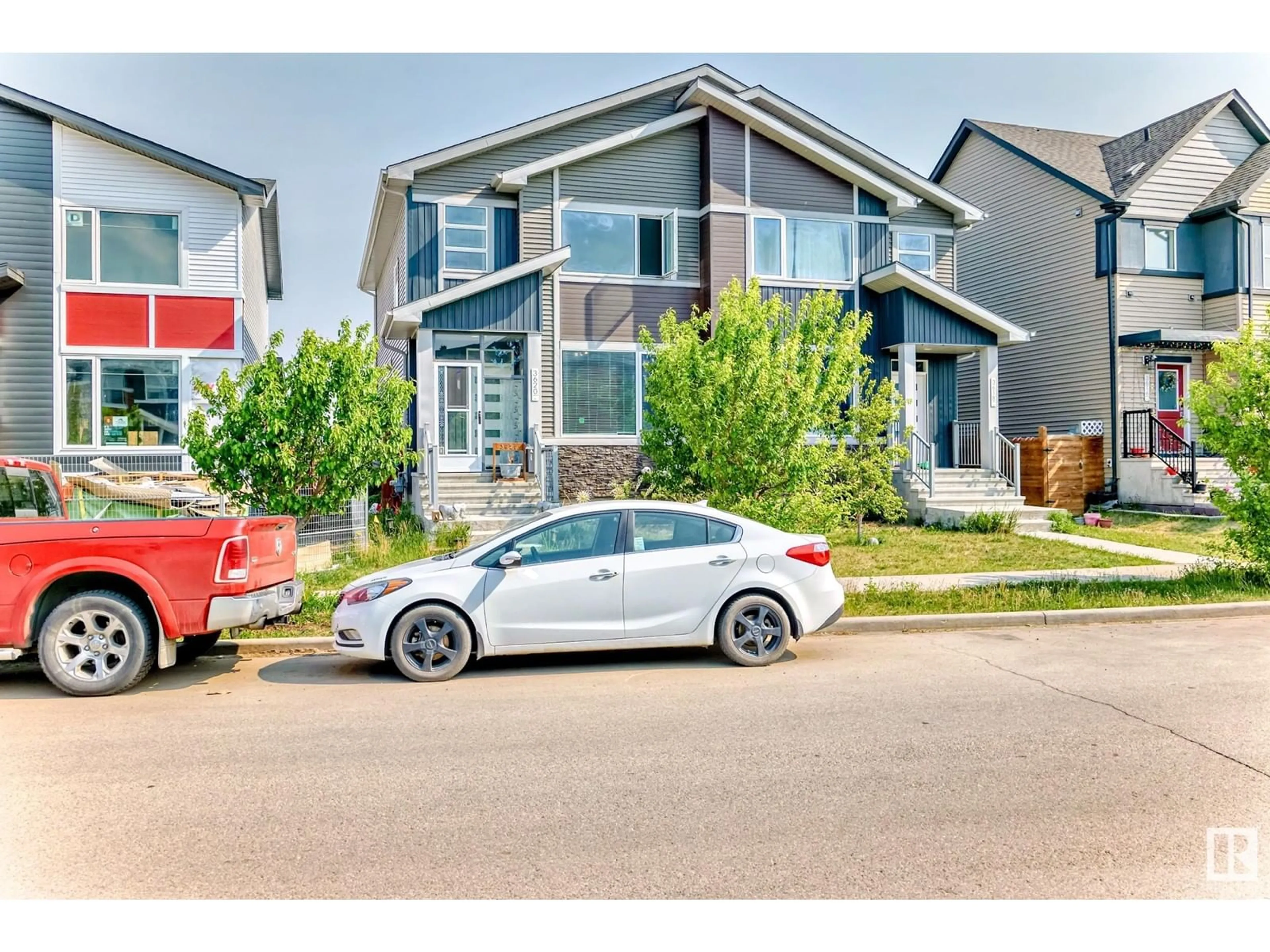 Home with vinyl exterior material, street for 3620 8 AV, Edmonton Alberta T6X2G6