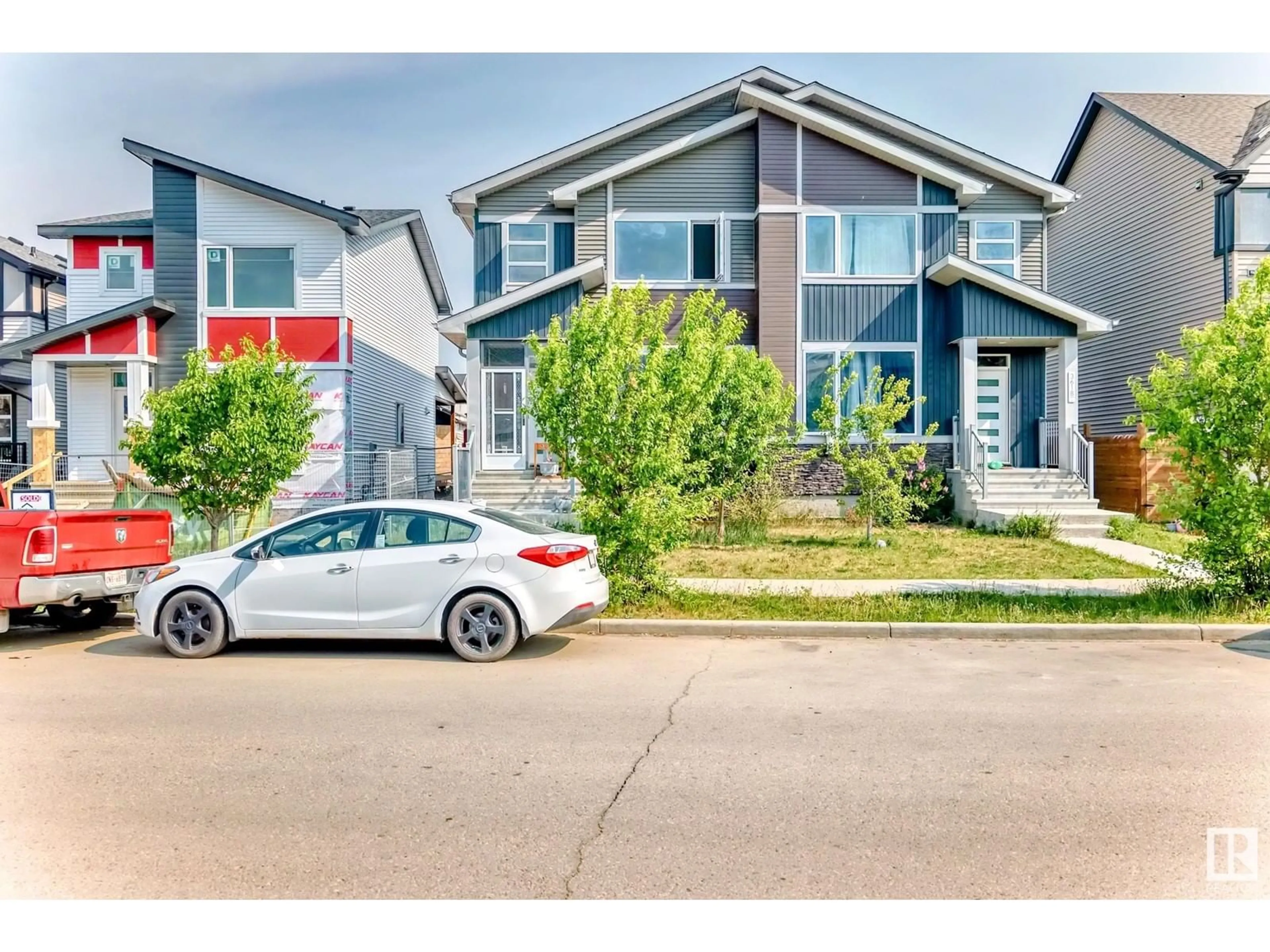 Home with vinyl exterior material, street for 3620 8 AV, Edmonton Alberta T6X2G6