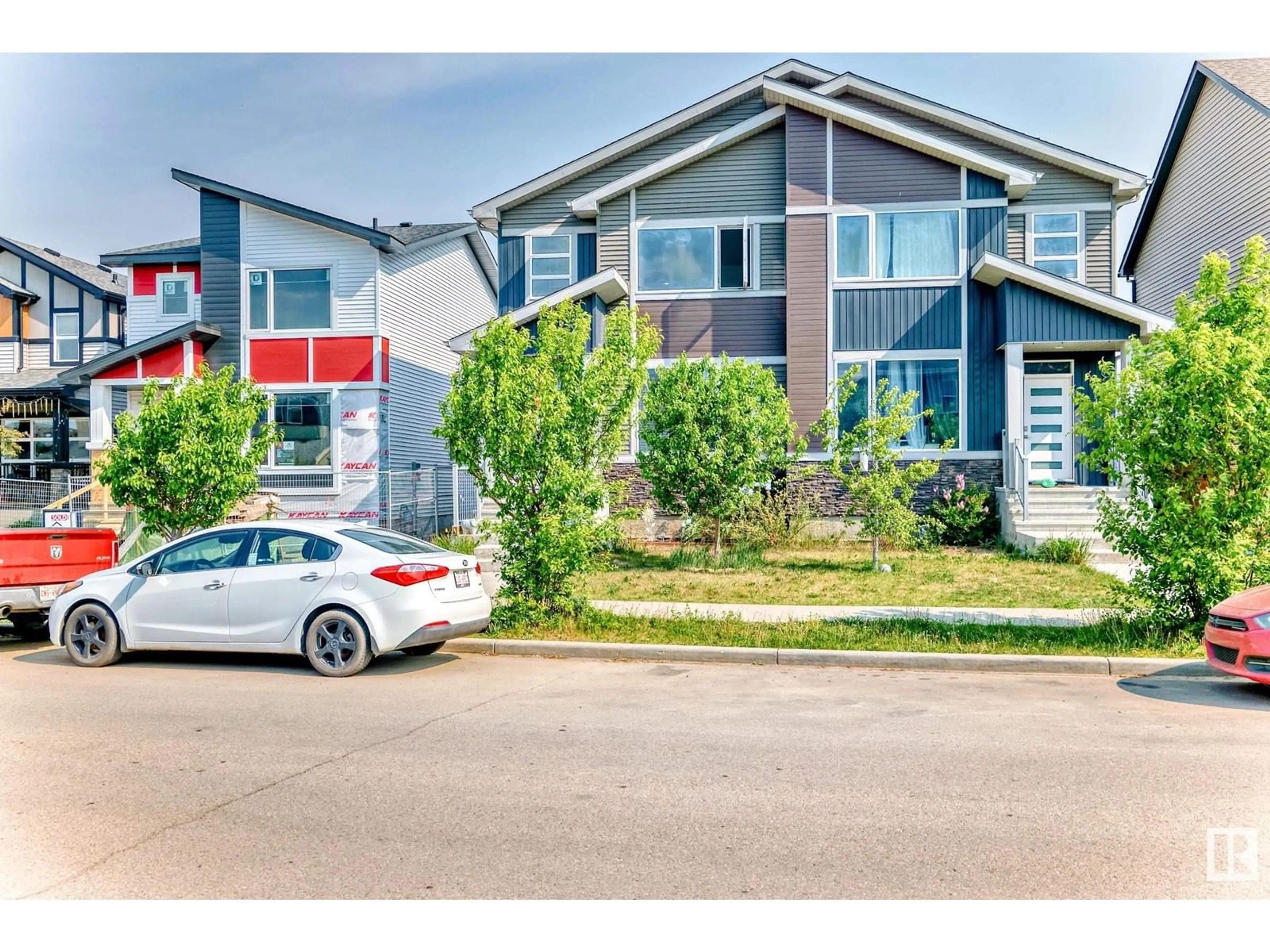 Home with vinyl exterior material, street for 3620 8 AV, Edmonton Alberta T6X2G6
