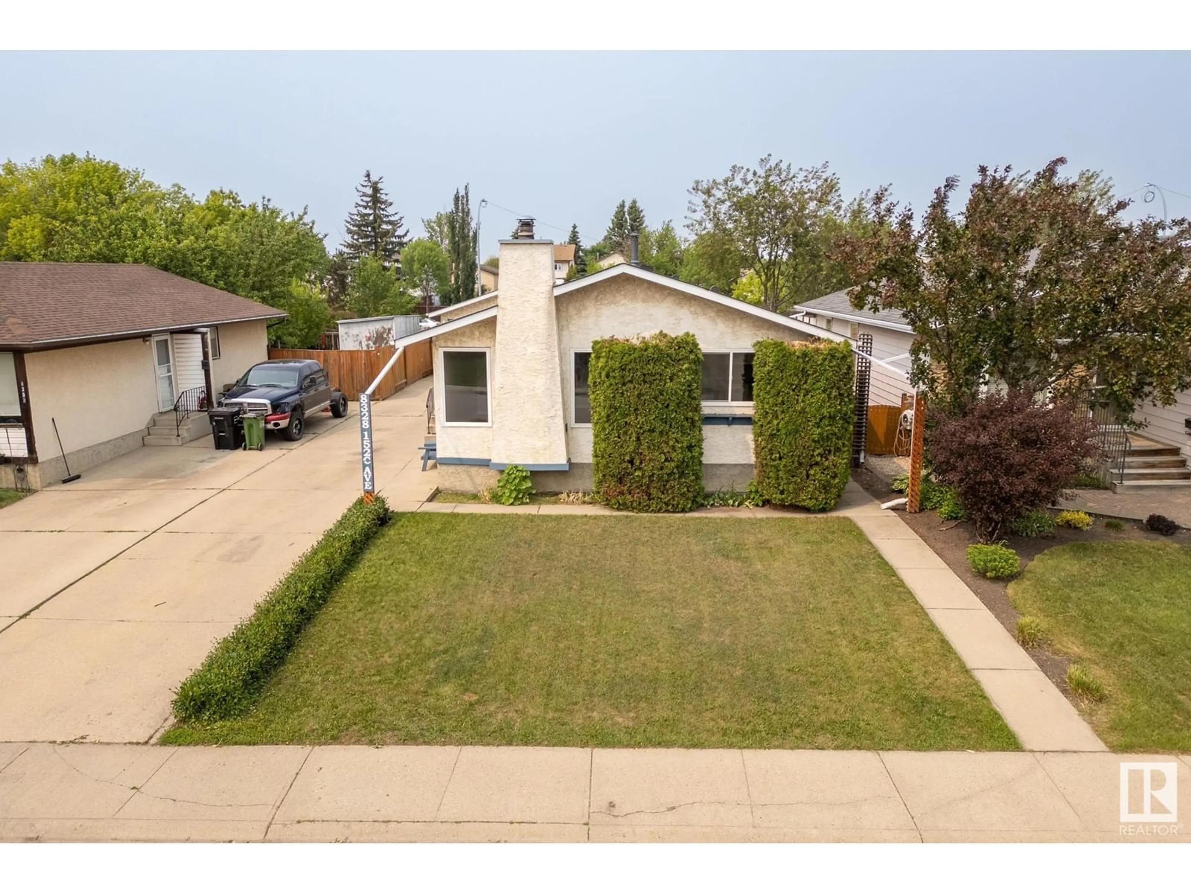A pic from outside/outdoor area/front of a property/back of a property/a pic from drone, street for NW - 8328 152C AV, Edmonton Alberta T5E6E9
