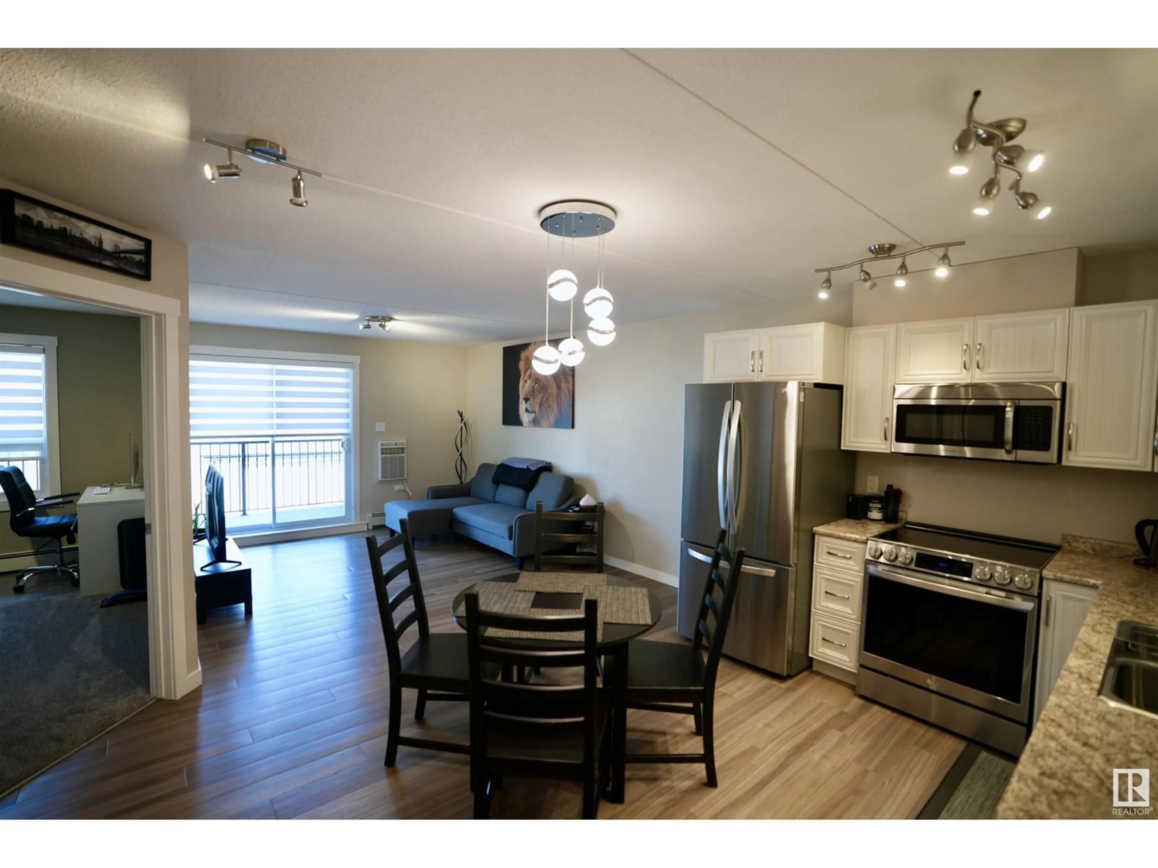 Open concept kitchen, wood/laminate floor for 201 - 4614B LAKESHORE DR, St. Paul Town Alberta T0A3A3