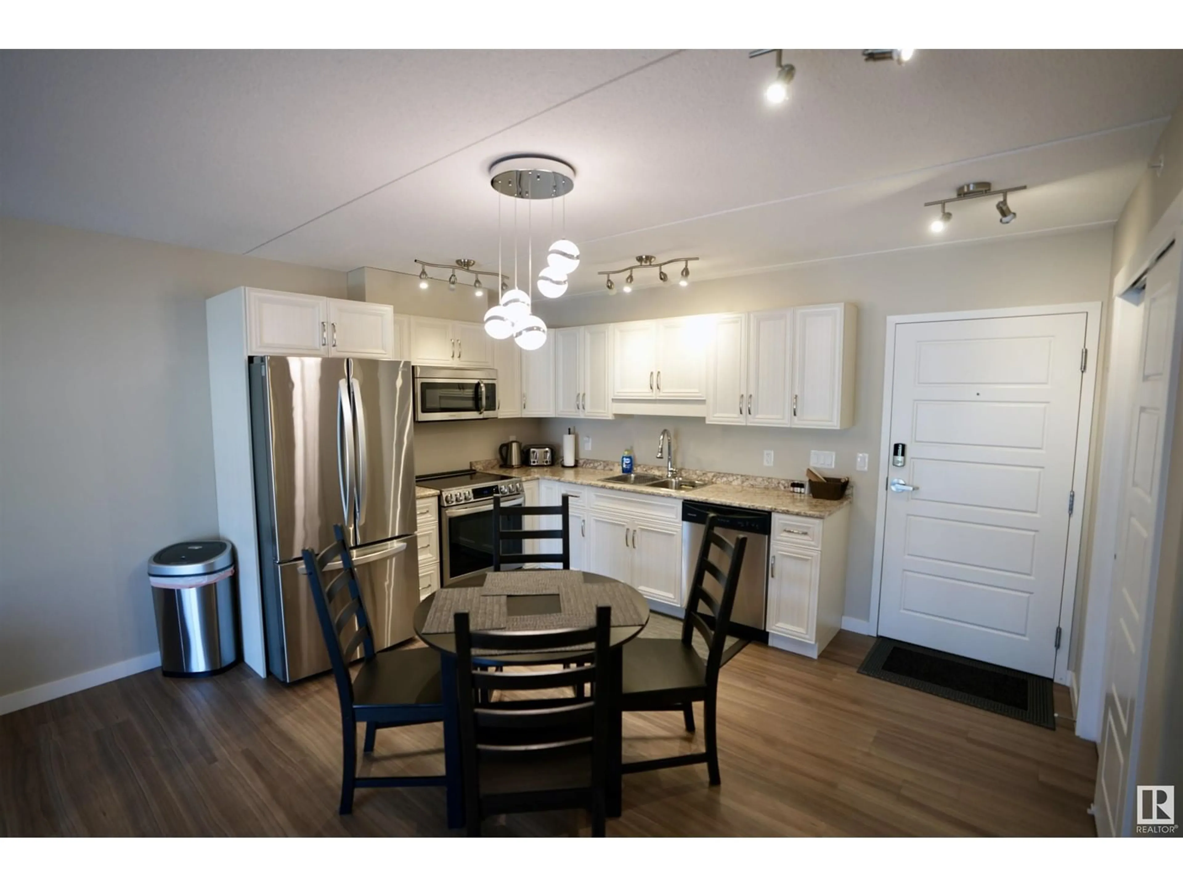 Open concept kitchen, wood/laminate floor for 201 - 4614B LAKESHORE DR, St. Paul Town Alberta T0A3A3