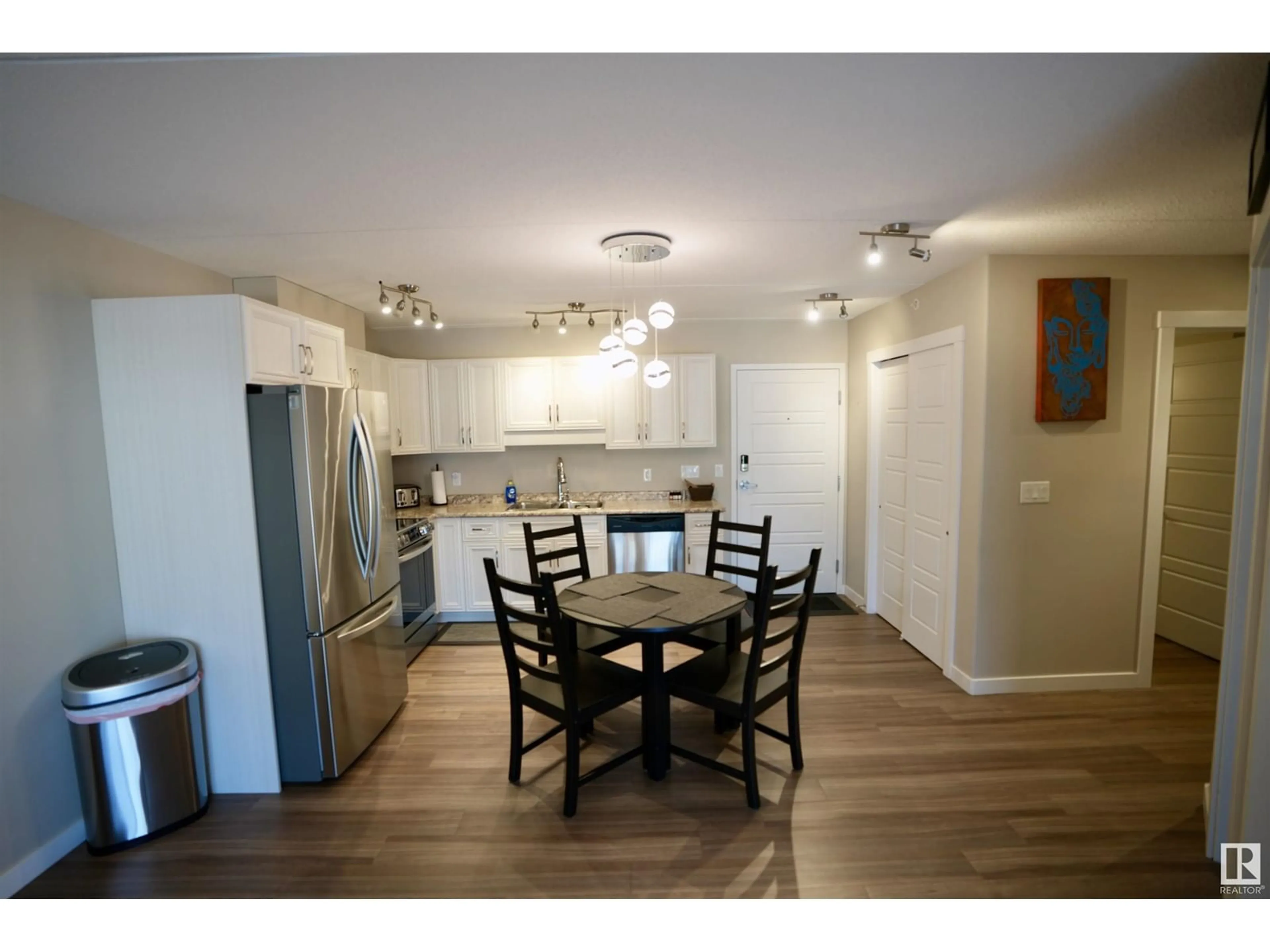 Open concept kitchen, wood/laminate floor for 201 - 4614B LAKESHORE DR, St. Paul Town Alberta T0A3A3