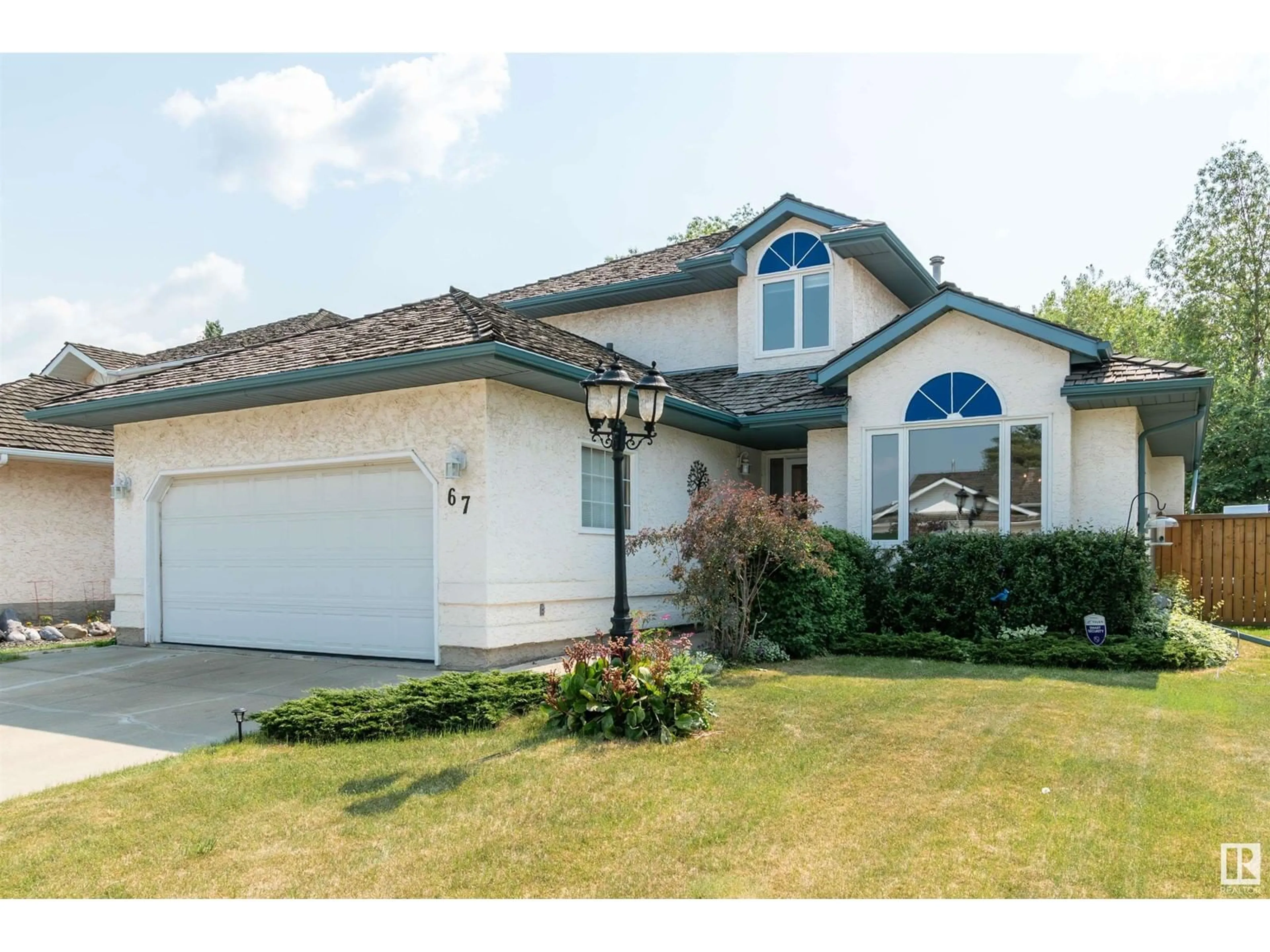 Home with vinyl exterior material, street for 67 NOTTINGHAM RD, Sherwood Park Alberta T8A5L5