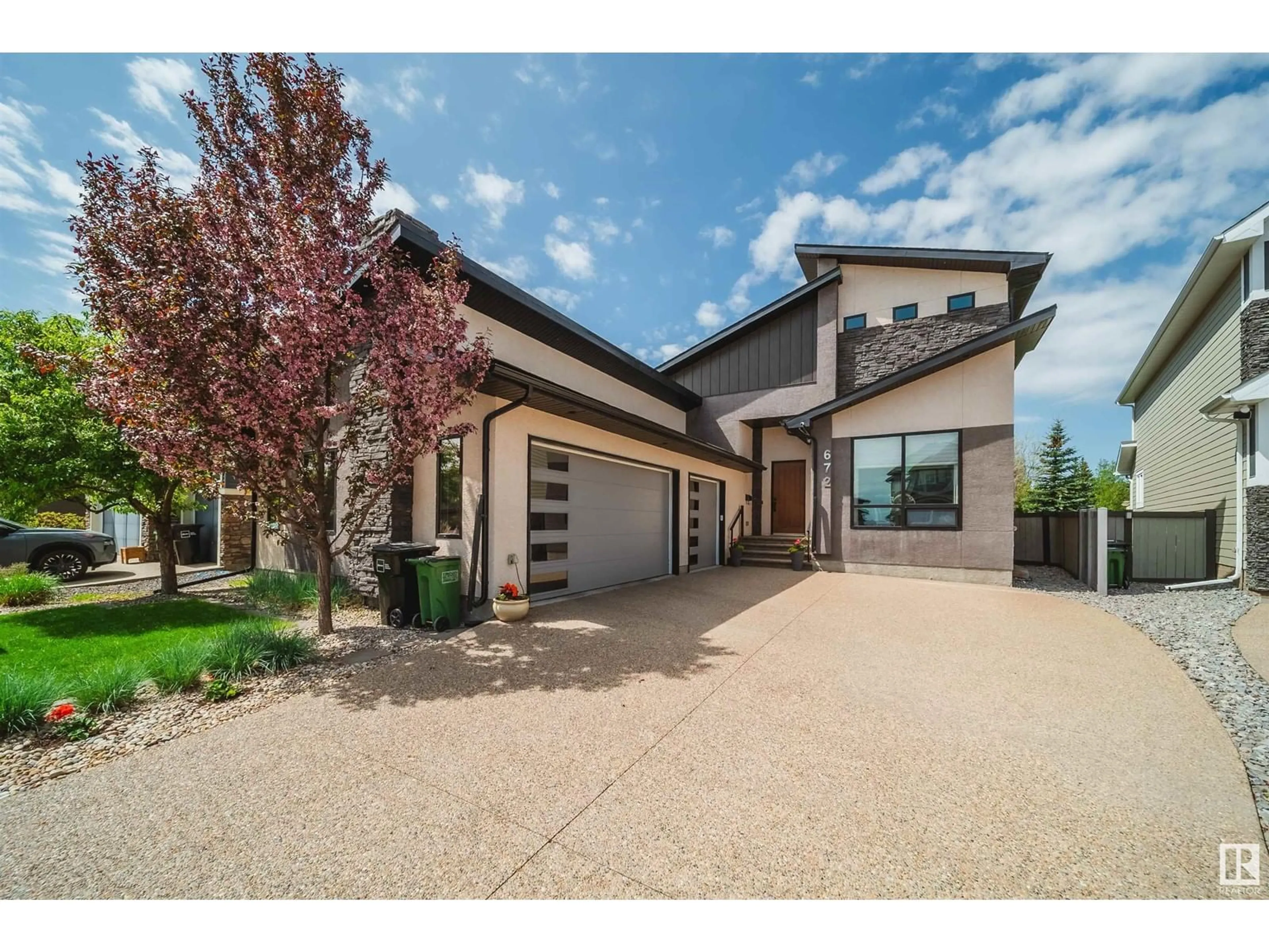 Home with brick exterior material, street for SW - 672 180 ST, Edmonton Alberta T6W2S8