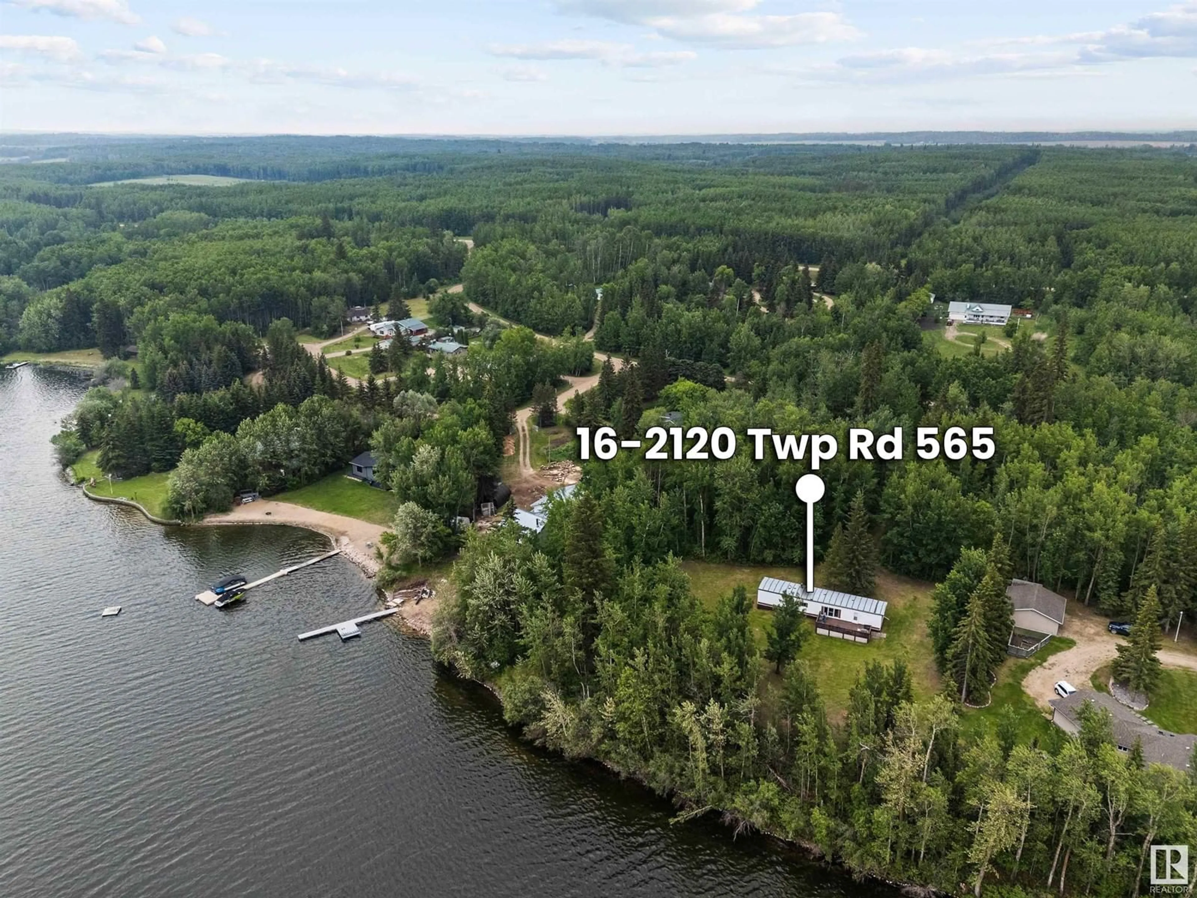 A pic from outside/outdoor area/front of a property/back of a property/a pic from drone, water/lake/river/ocean view for 2120 - 16 TWP ROAD 565, Rural Lac Ste. Anne County Alberta T0E1V0
