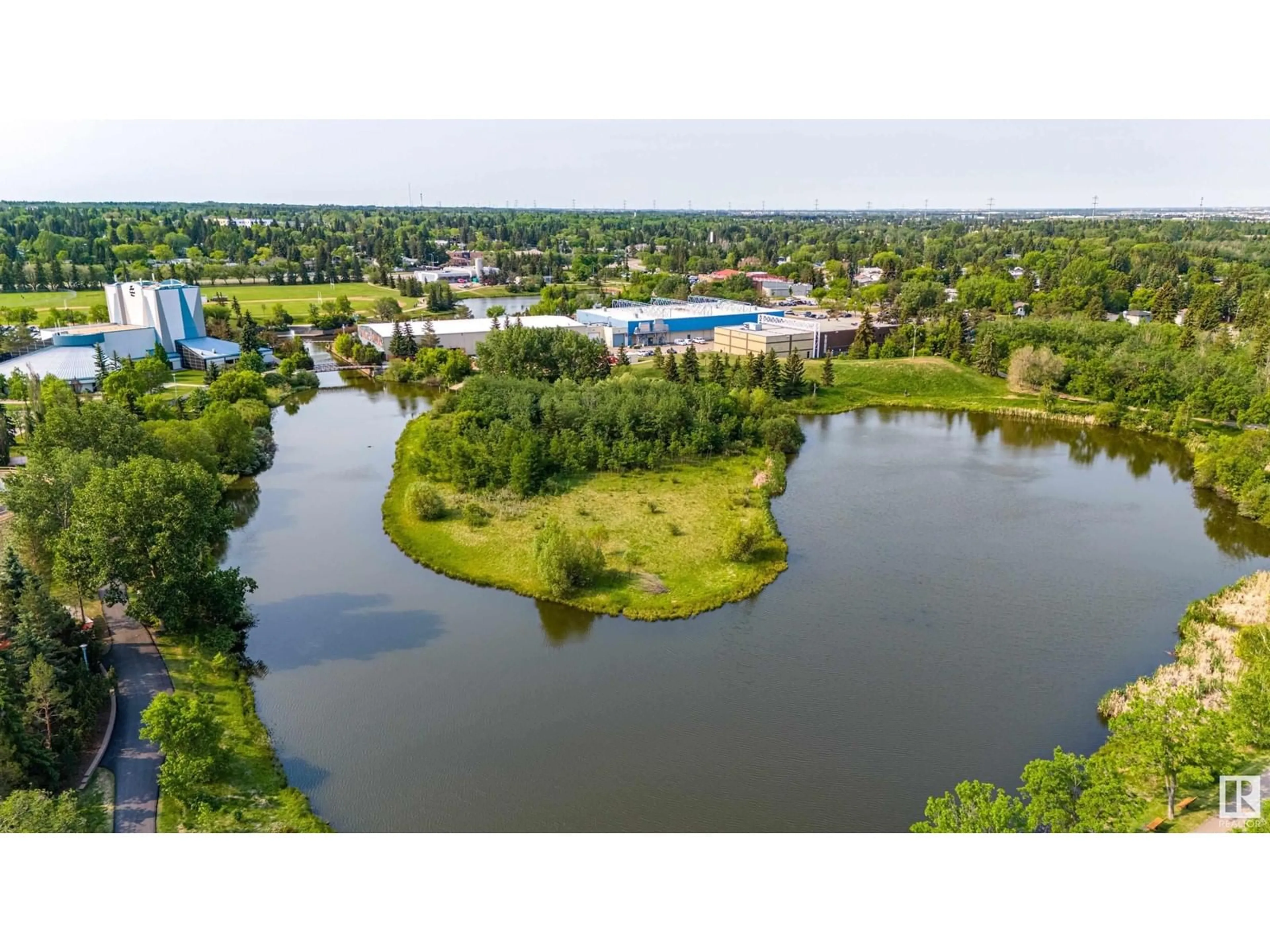 A pic from outside/outdoor area/front of a property/back of a property/a pic from drone, water/lake/river/ocean view for 1999 GLENMORE AV, Sherwood Park Alberta T8A0X7
