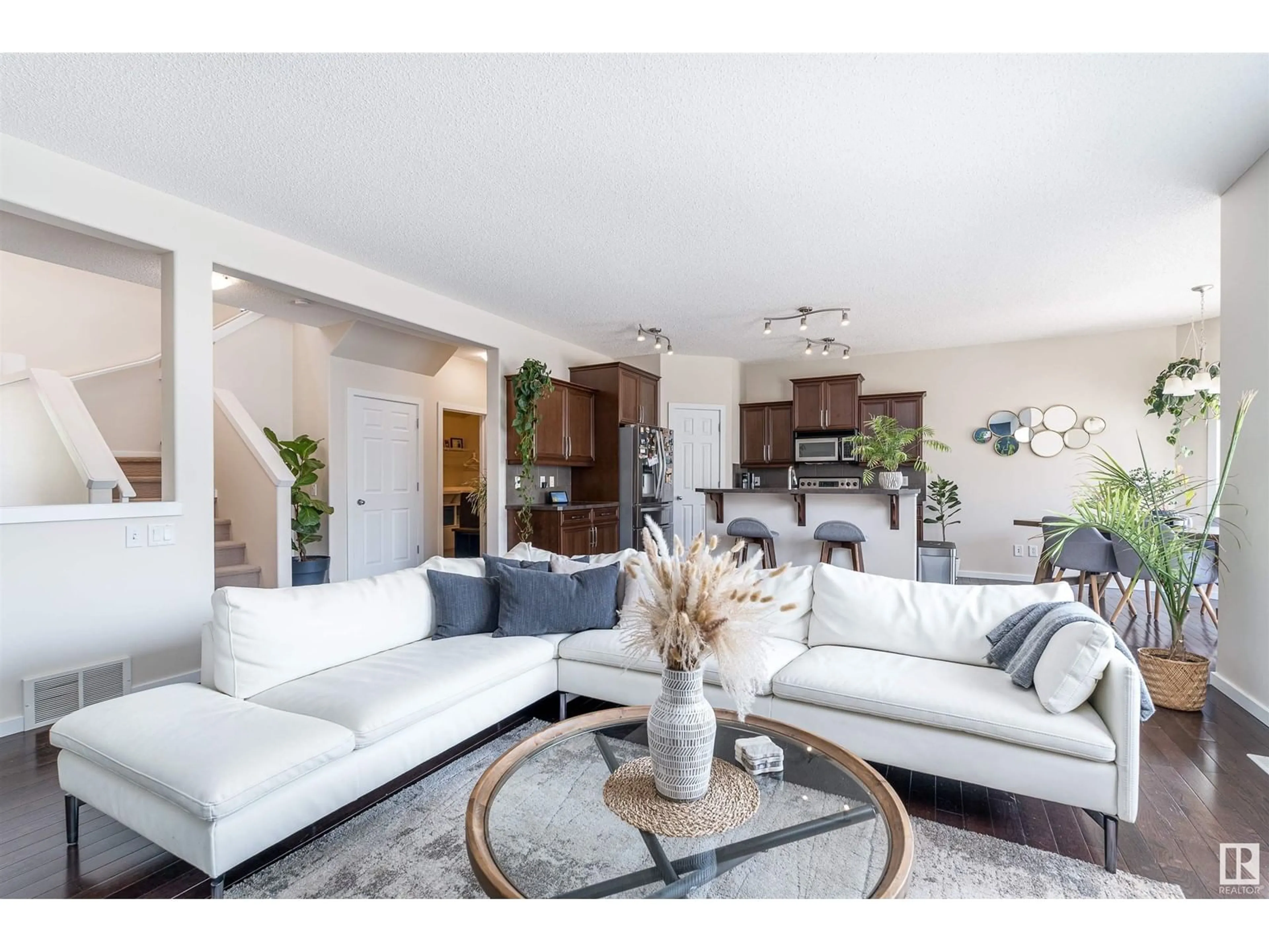 Living room with furniture, unknown for 8715 10 AV SW, Edmonton Alberta T6X1J6