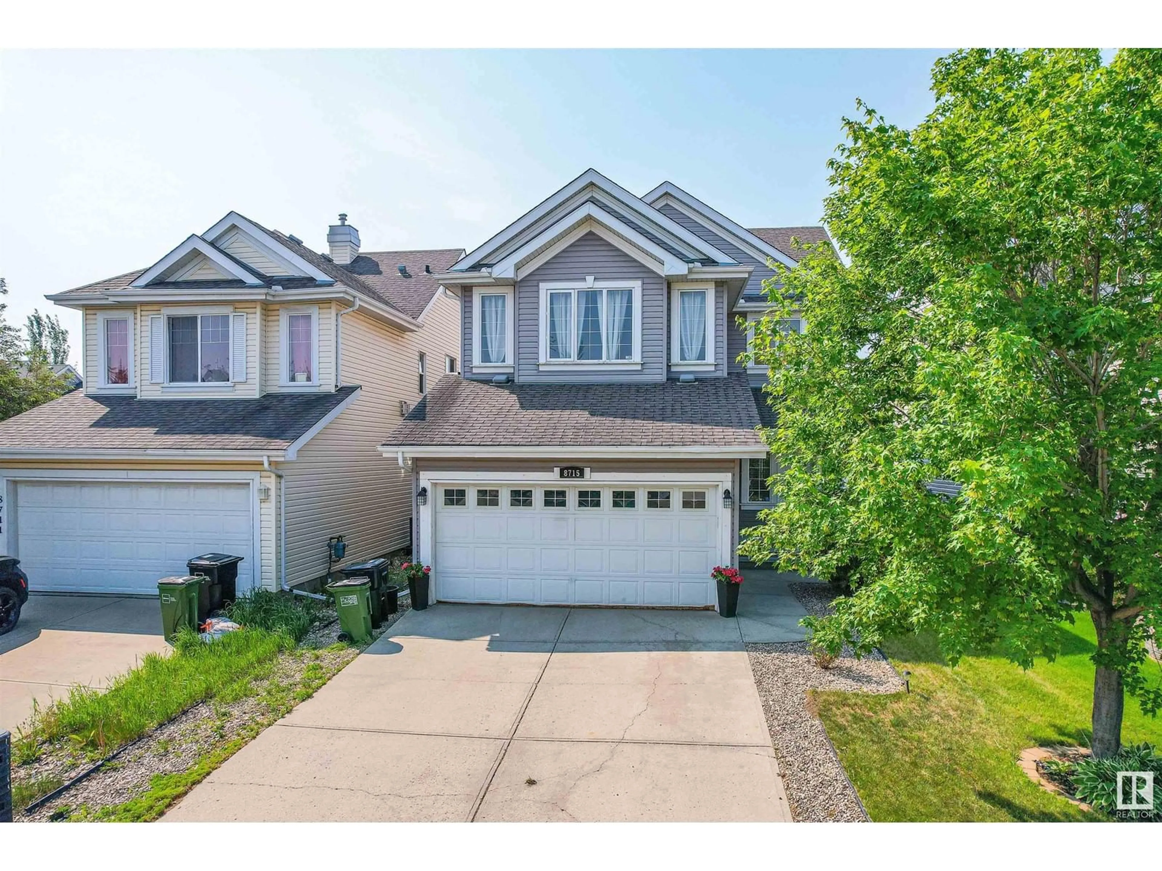 A pic from outside/outdoor area/front of a property/back of a property/a pic from drone, street for 8715 10 AV SW, Edmonton Alberta T6X1J6