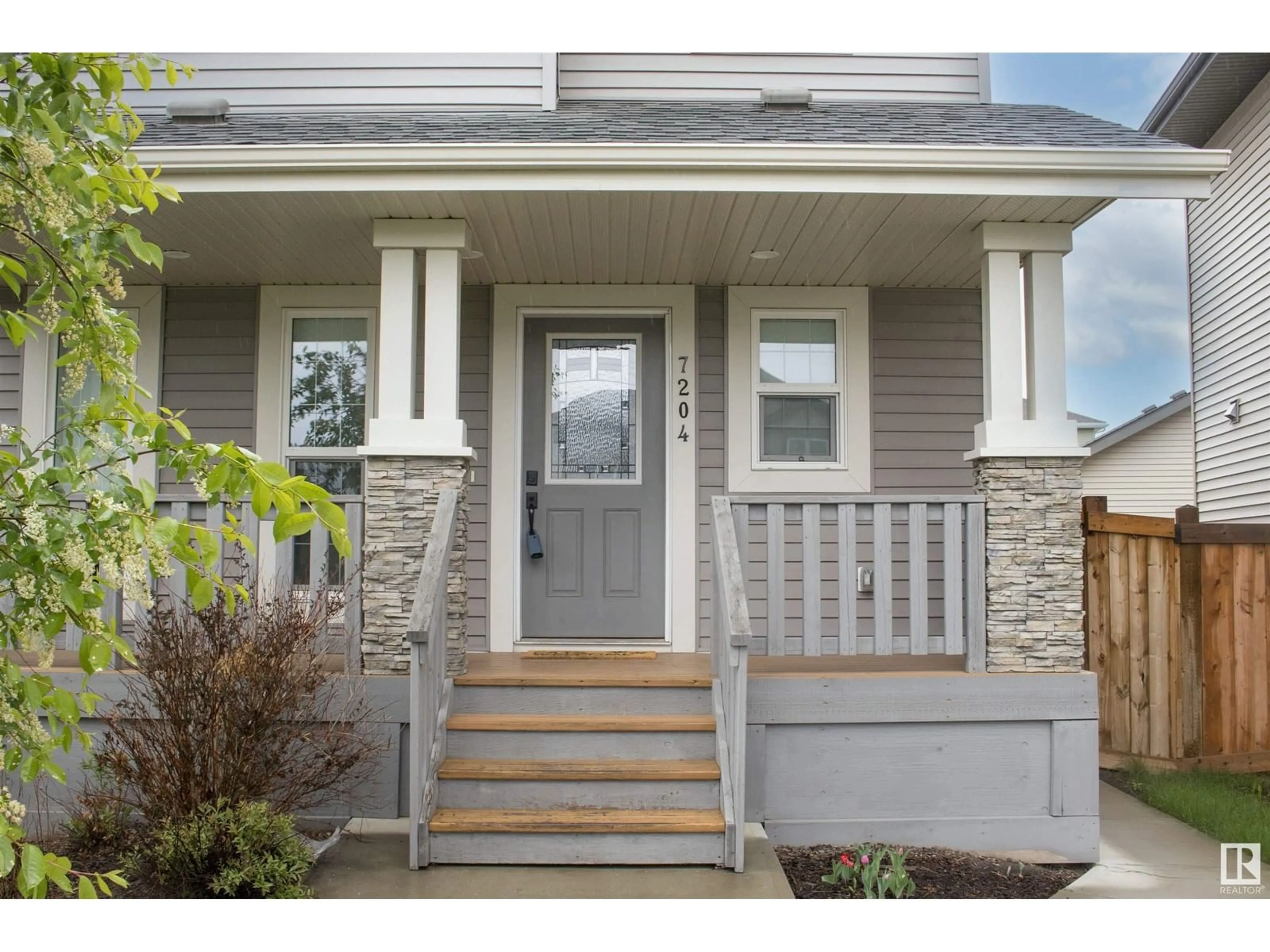 Home with vinyl exterior material, street for 7204 CARDINAL WY, Edmonton Alberta T6W2Y5