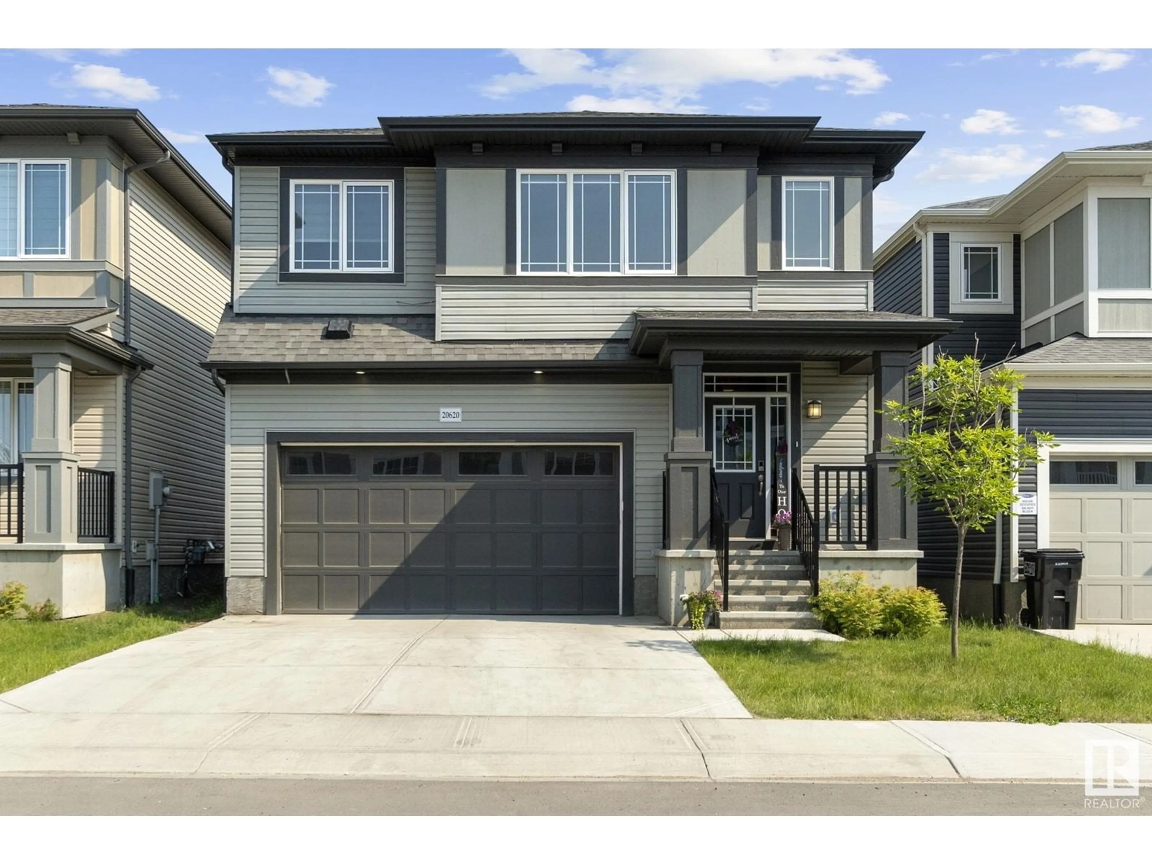 Home with vinyl exterior material, street for 20620 22AVE NW, Edmonton Alberta T6M1N3