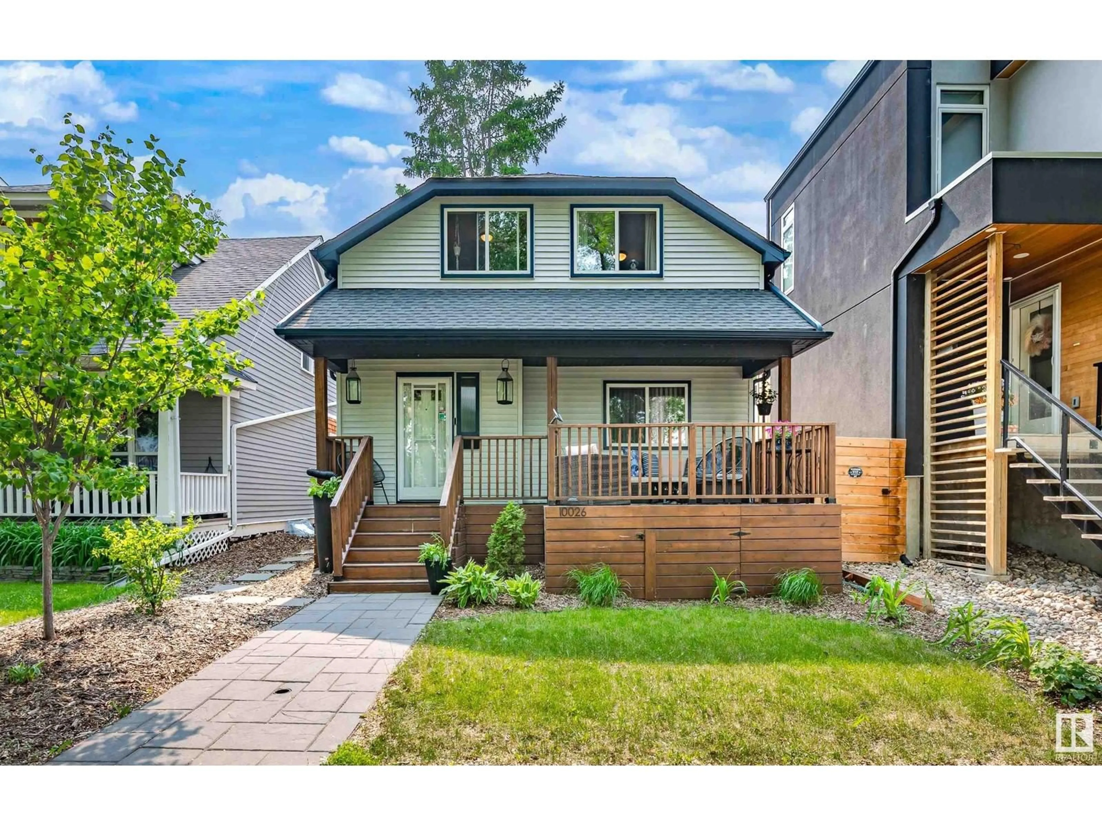 Home with brick exterior material, street for NW - 10026 93 ST, Edmonton Alberta T5H1W7