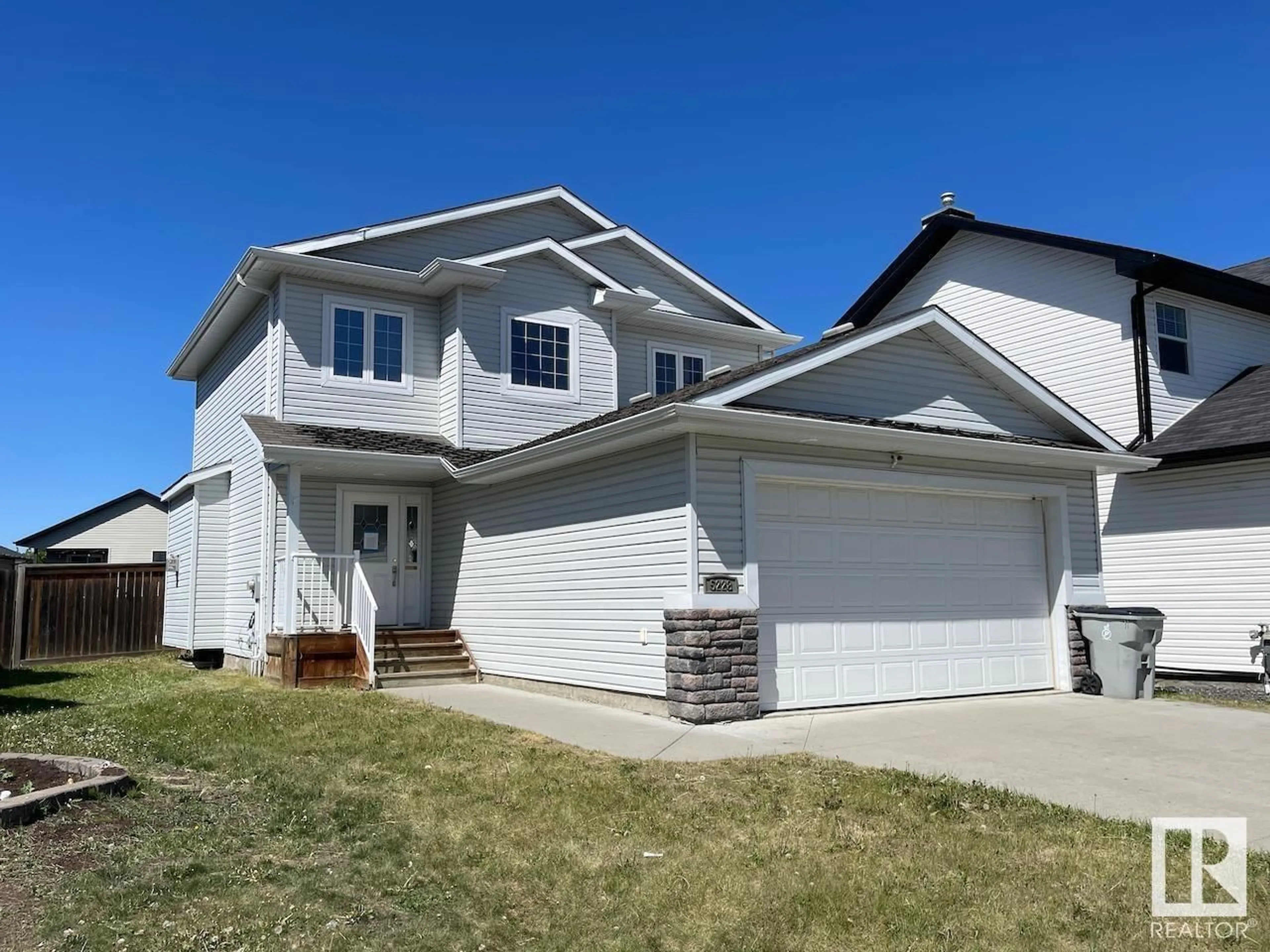 Home with vinyl exterior material, street for 5228 39 AV, Gibbons Alberta T0A1N0