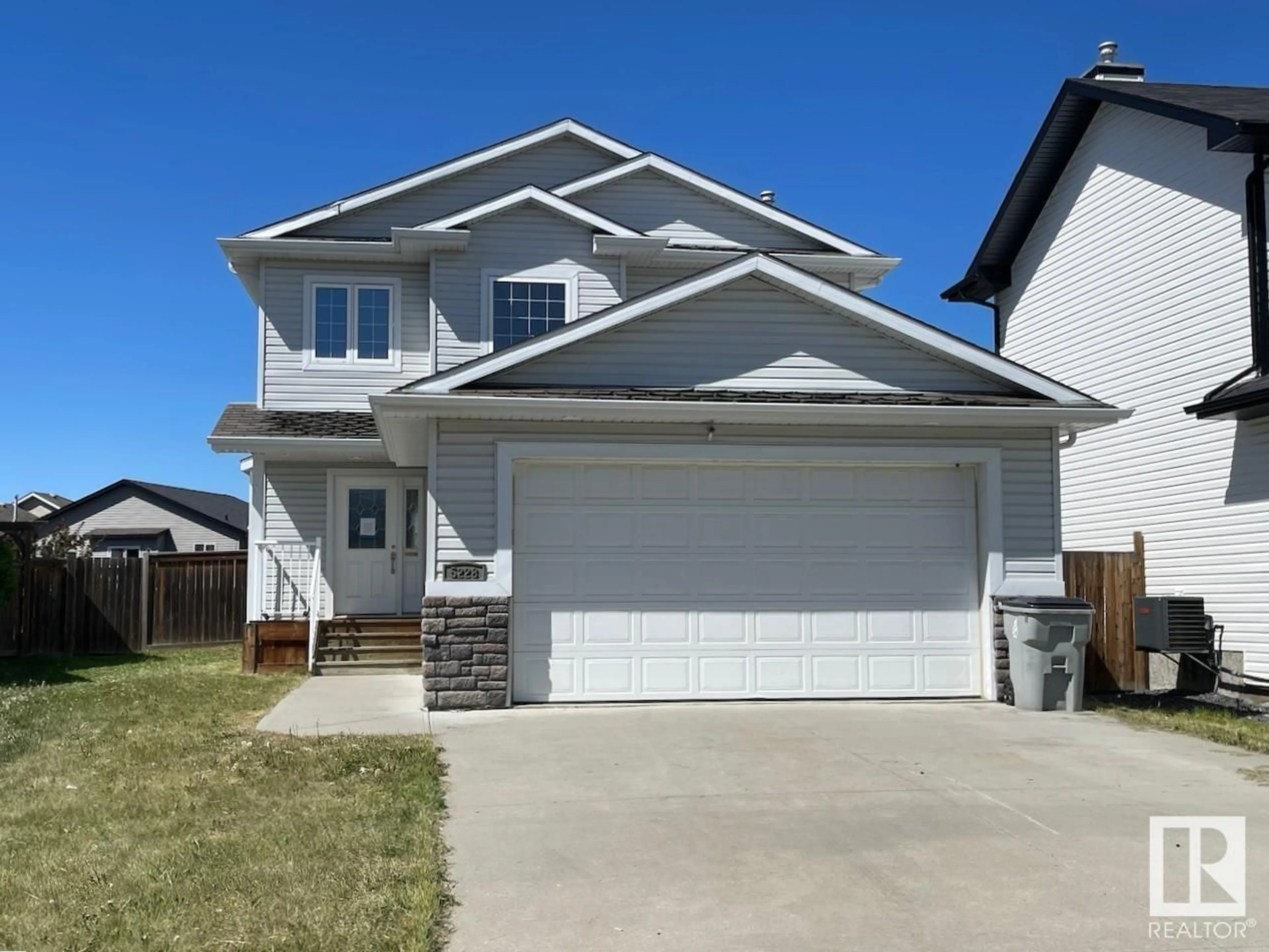 Home with vinyl exterior material, street for 5228 39 AV, Gibbons Alberta T0A1N0