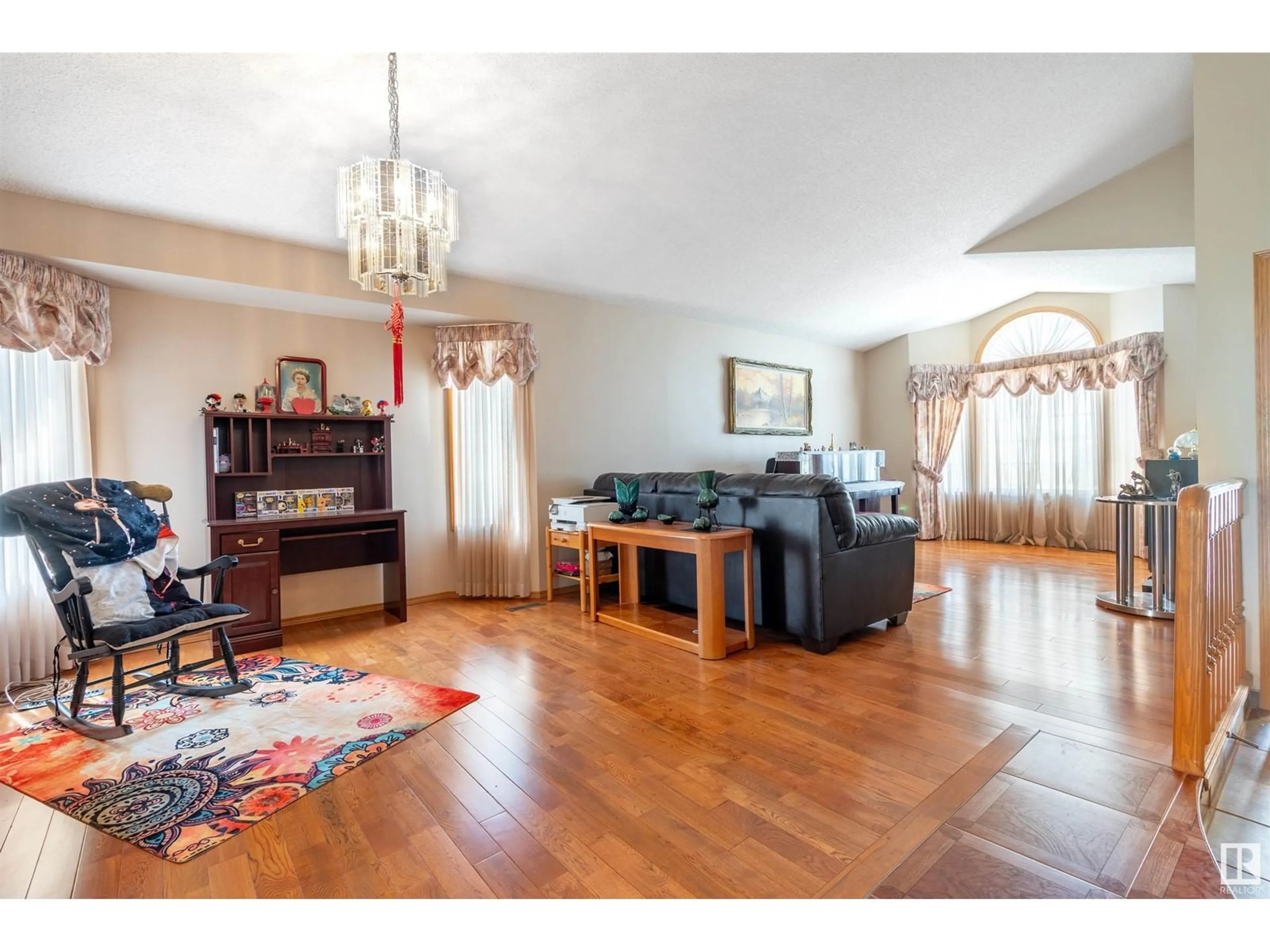 Living room with furniture, wood/laminate floor for 17411 98 ST, Edmonton Alberta T5X5V5