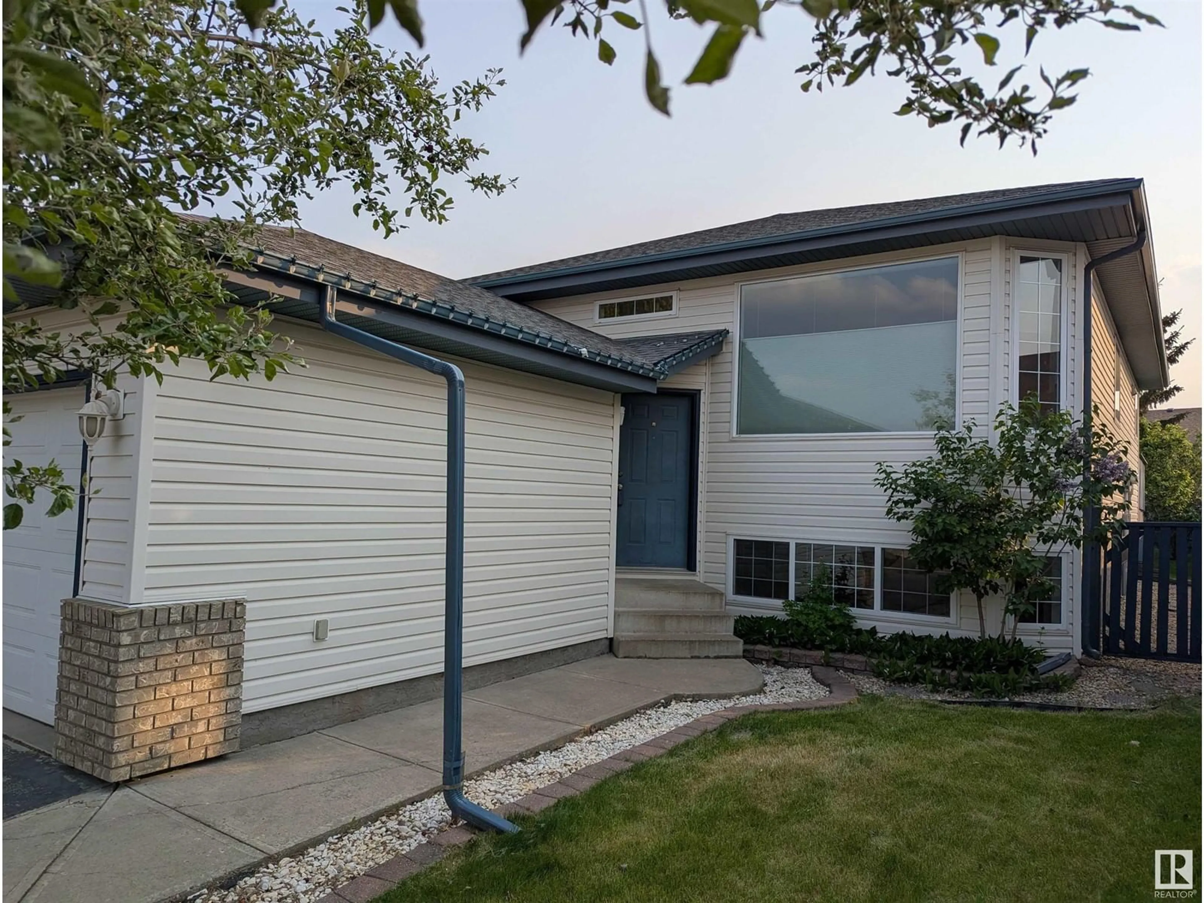 Home with vinyl exterior material, street for NW - 4704 189 ST, Edmonton Alberta T6M2S8