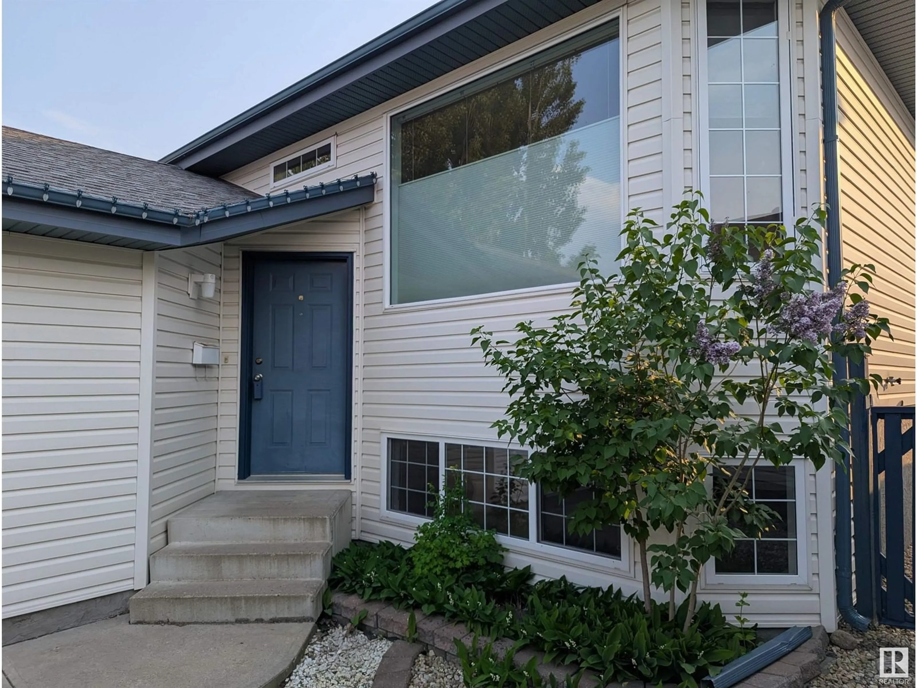 Home with vinyl exterior material, street for NW - 4704 189 ST, Edmonton Alberta T6M2S8