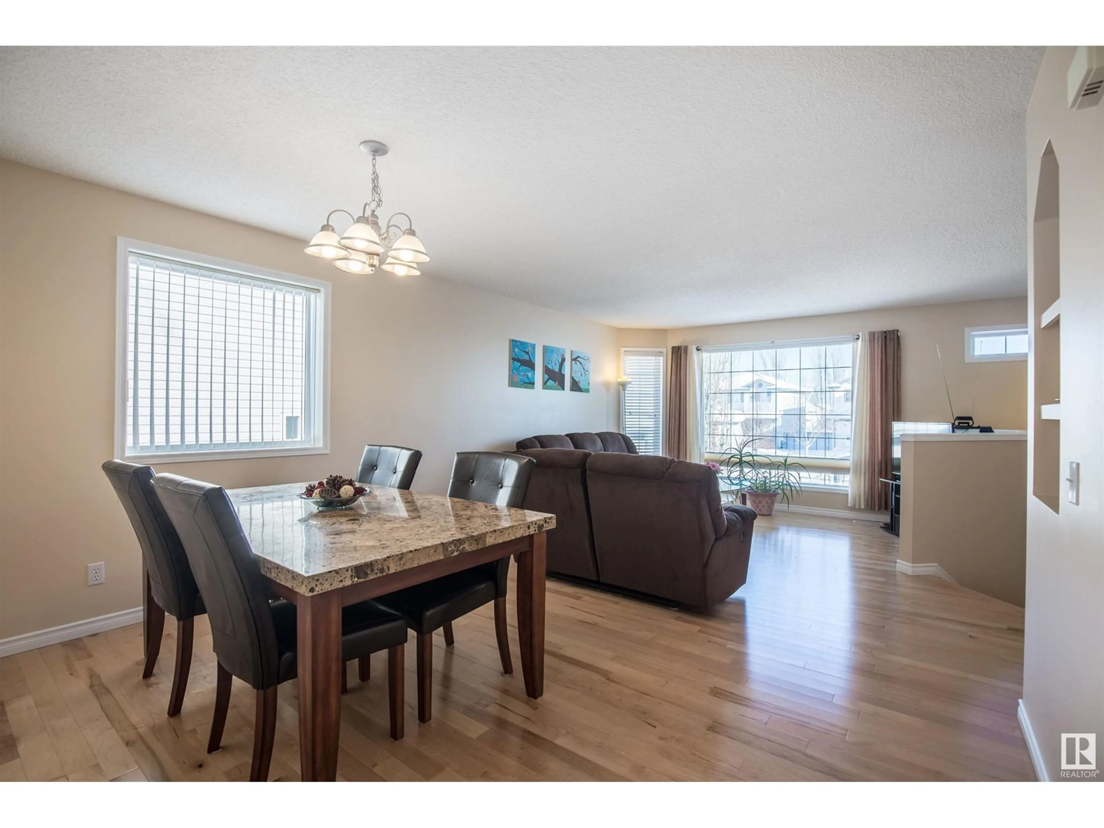 Dining room, wood/laminate floor for NW - 4704 189 ST, Edmonton Alberta T6M2S8