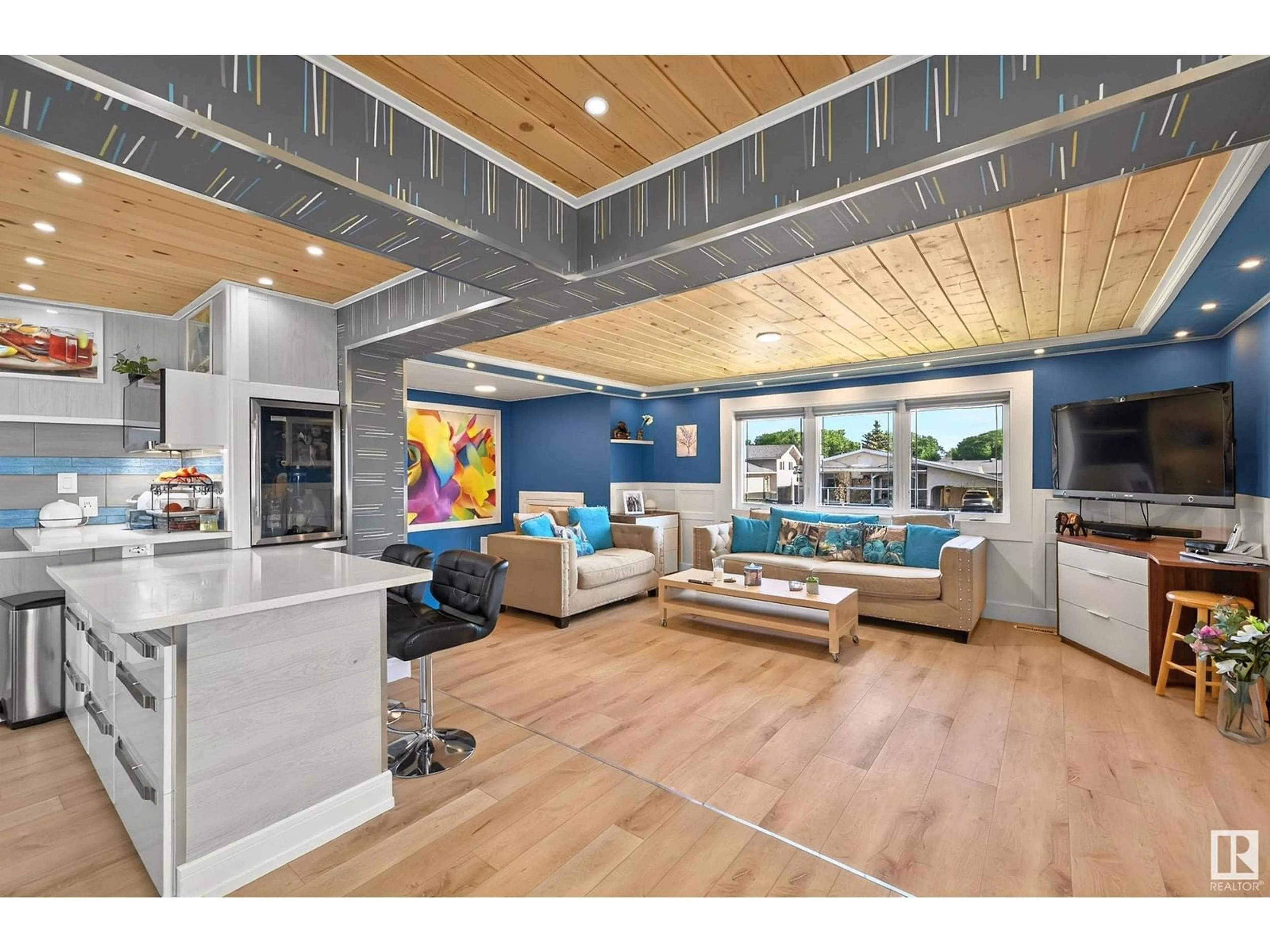 Open concept kitchen, wood/laminate floor for NW - 11423 144 AV, Edmonton Alberta T5X1L7