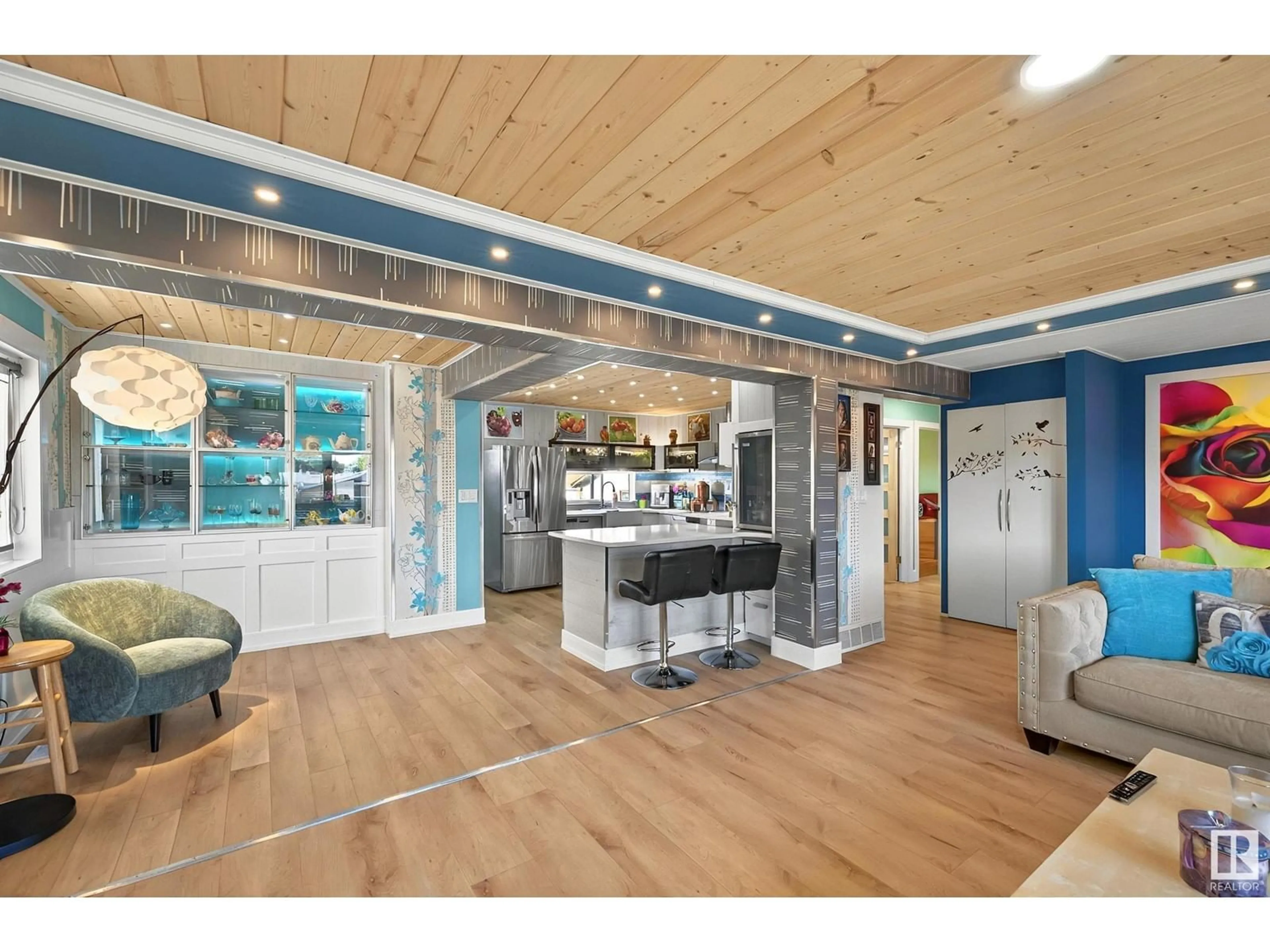 Open concept kitchen, wood/laminate floor for NW - 11423 144 AV, Edmonton Alberta T5X1L7