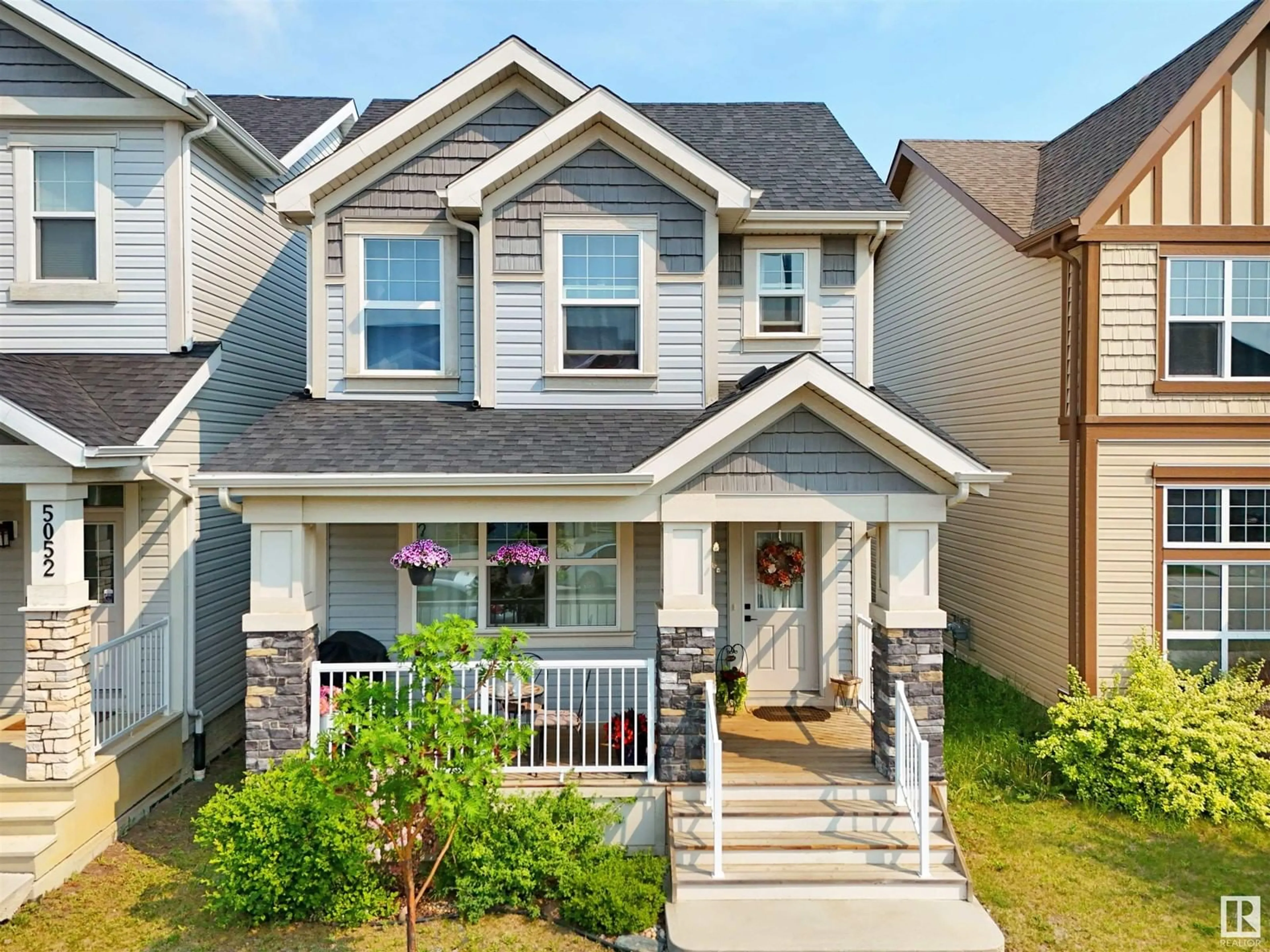 Home with vinyl exterior material, street for 5050 ANDISON CL, Edmonton Alberta T6W3T4