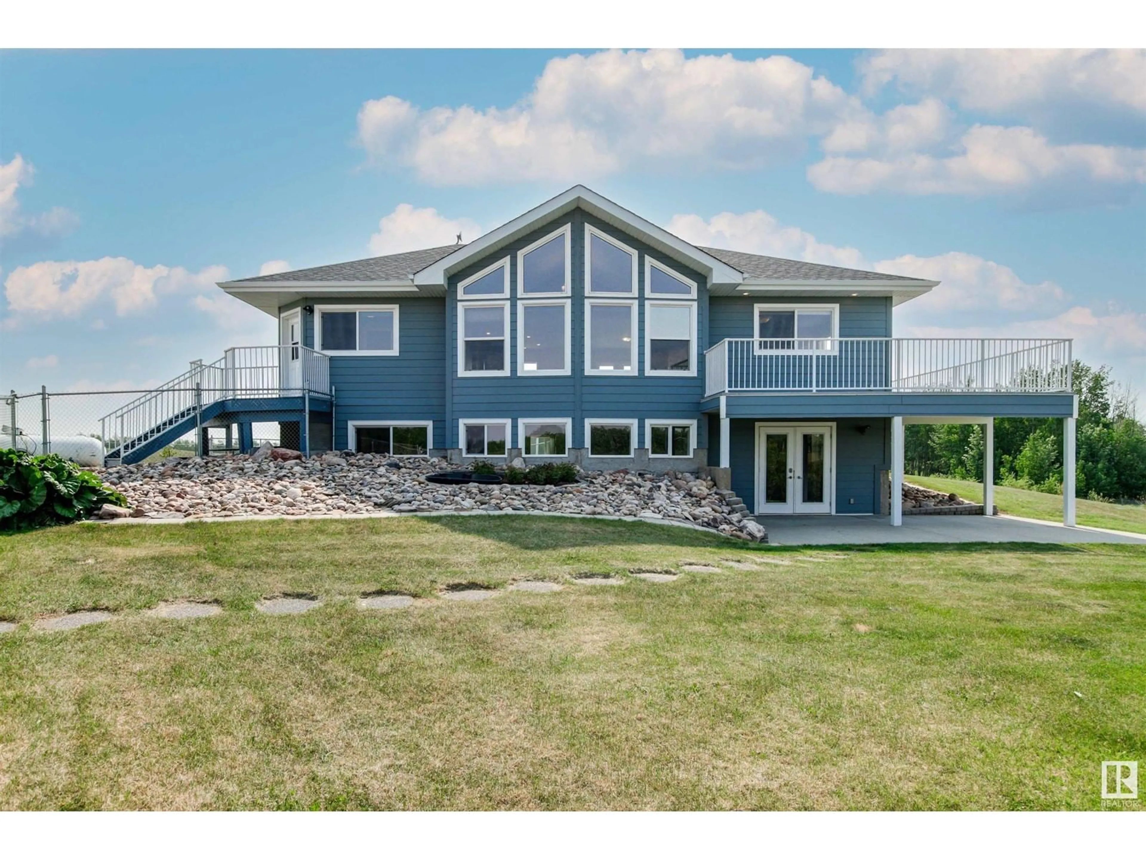 Home with vinyl exterior material, water/lake/river/ocean view for 49447 RGE ROAD 232, Rural Leduc County Alberta T4X0Z9