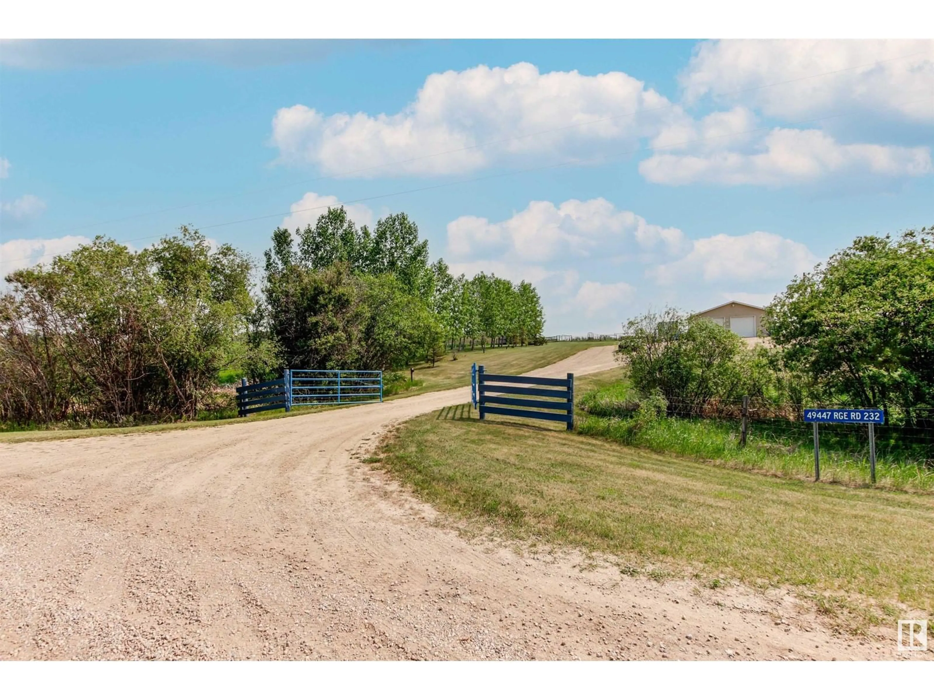 A pic from outside/outdoor area/front of a property/back of a property/a pic from drone, water/lake/river/ocean view for 49447 RGE ROAD 232, Rural Leduc County Alberta T4X0Z9