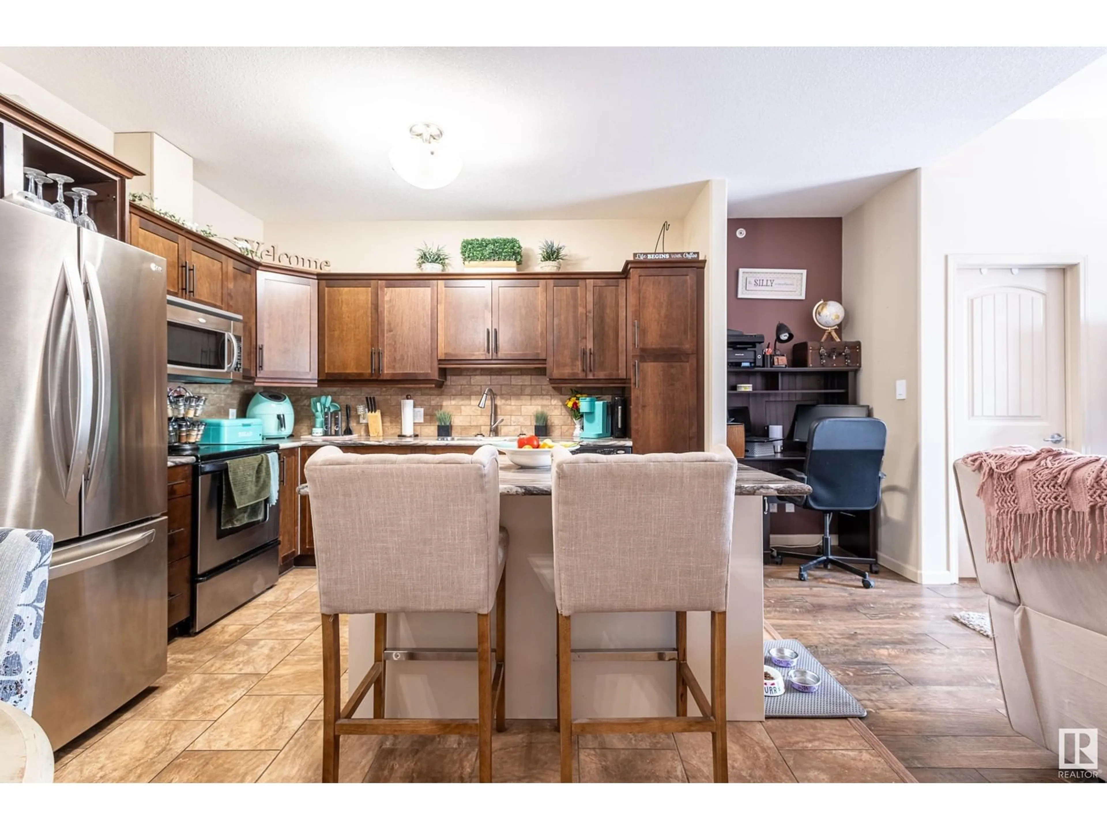 Open concept kitchen, unknown for #327 - 2503 HANNA CR, Edmonton Alberta T6R0H1