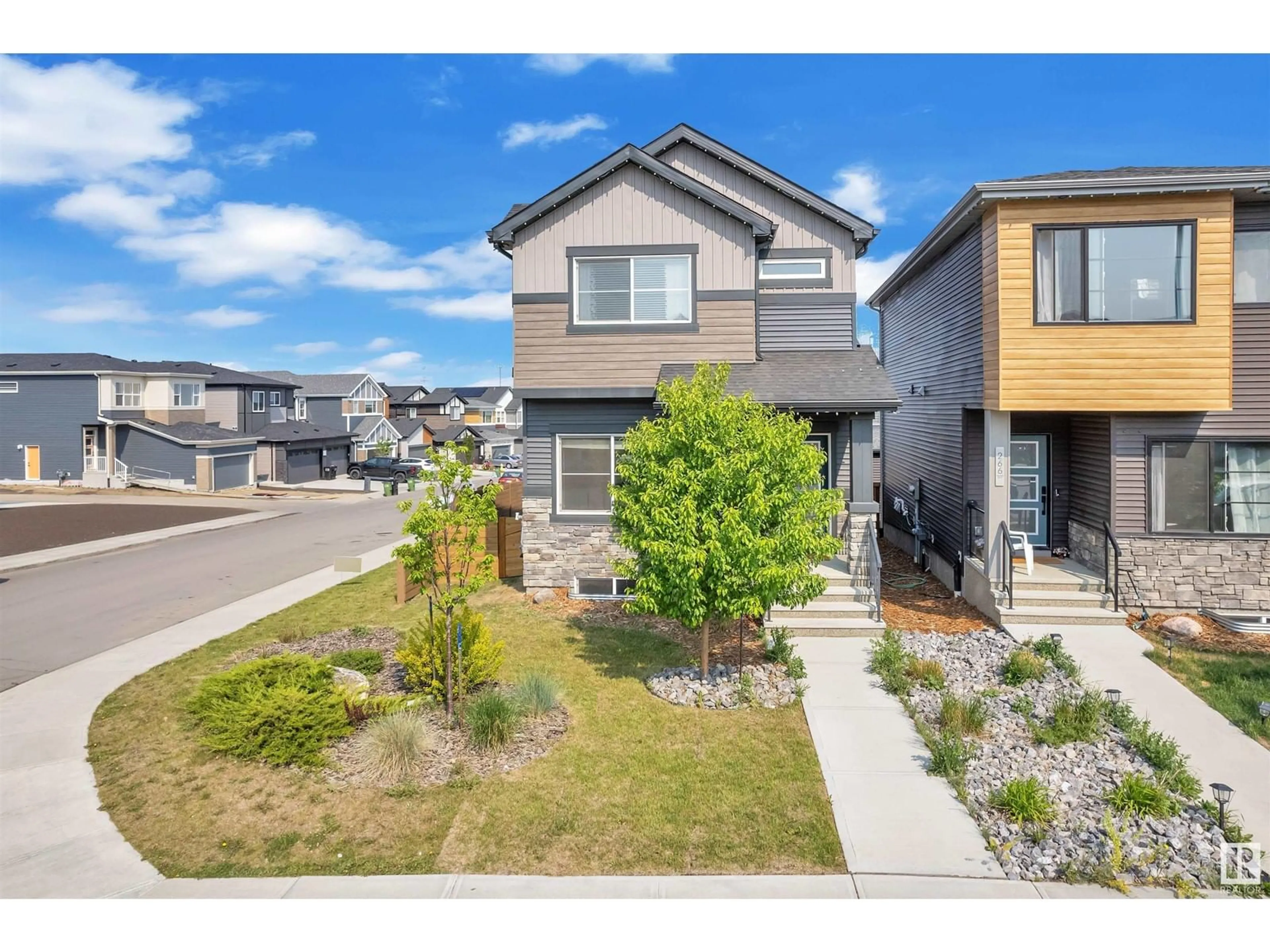 Home with vinyl exterior material, street for 268 CHARLESWORTH DR, Edmonton Alberta T6X2P4