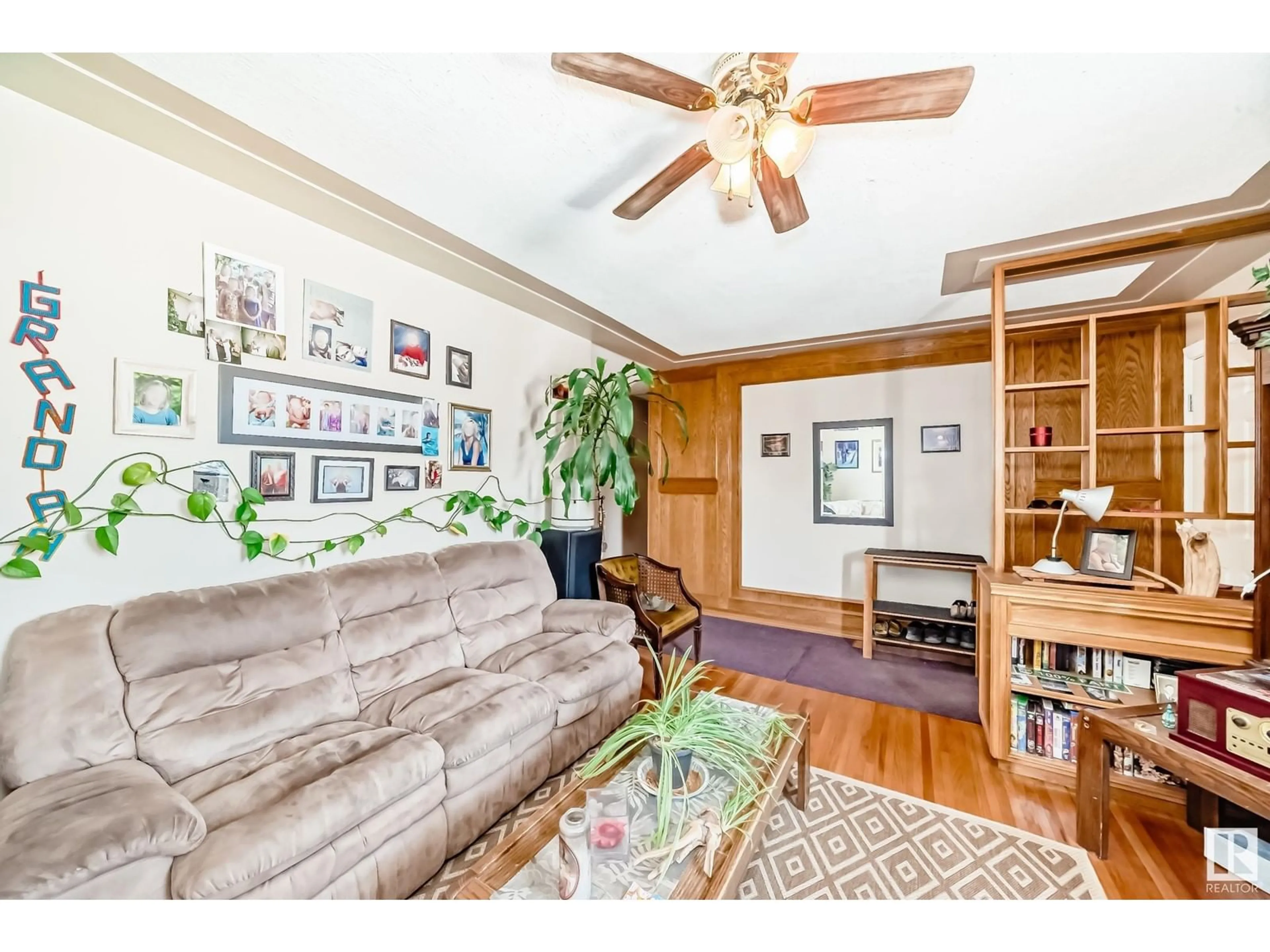 Living room with furniture, wood/laminate floor for NW - 9222 154 ST, Edmonton Alberta T5R1T5