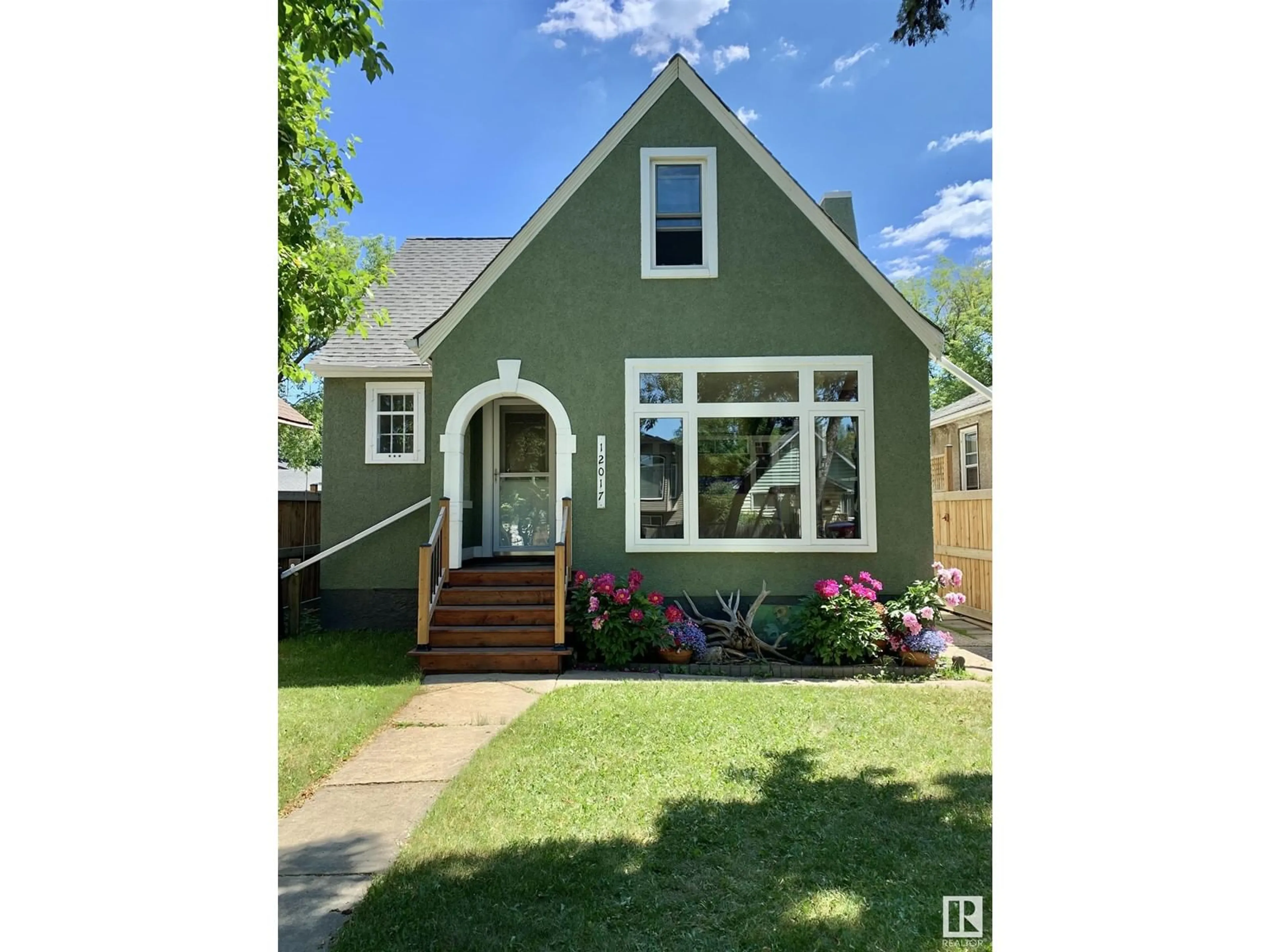 Home with vinyl exterior material, street for NW - 12017 95A ST, Edmonton Alberta T5G1R6