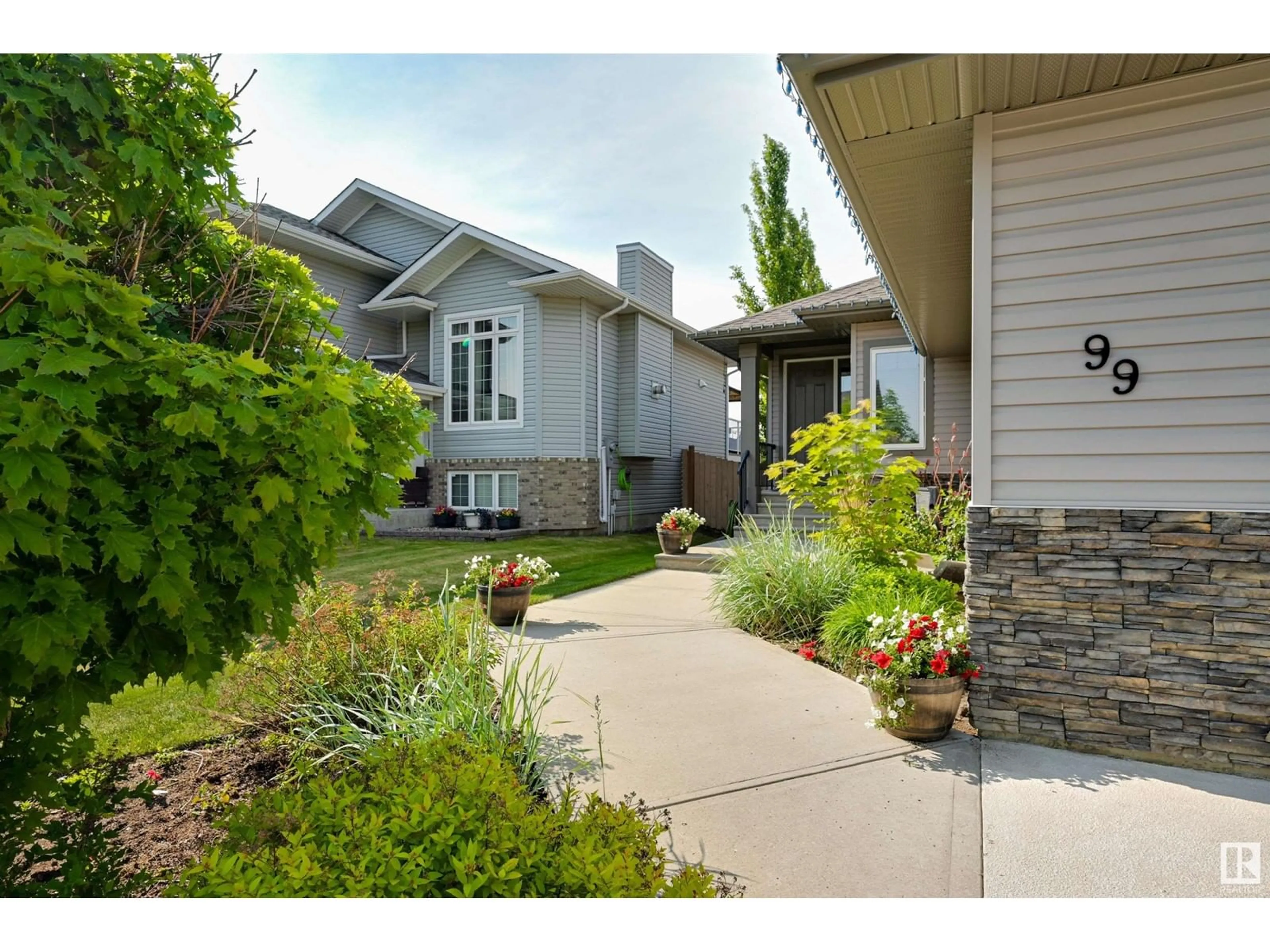 Home with vinyl exterior material, street for 99 WALTERS PL, Leduc Alberta T9E0G3