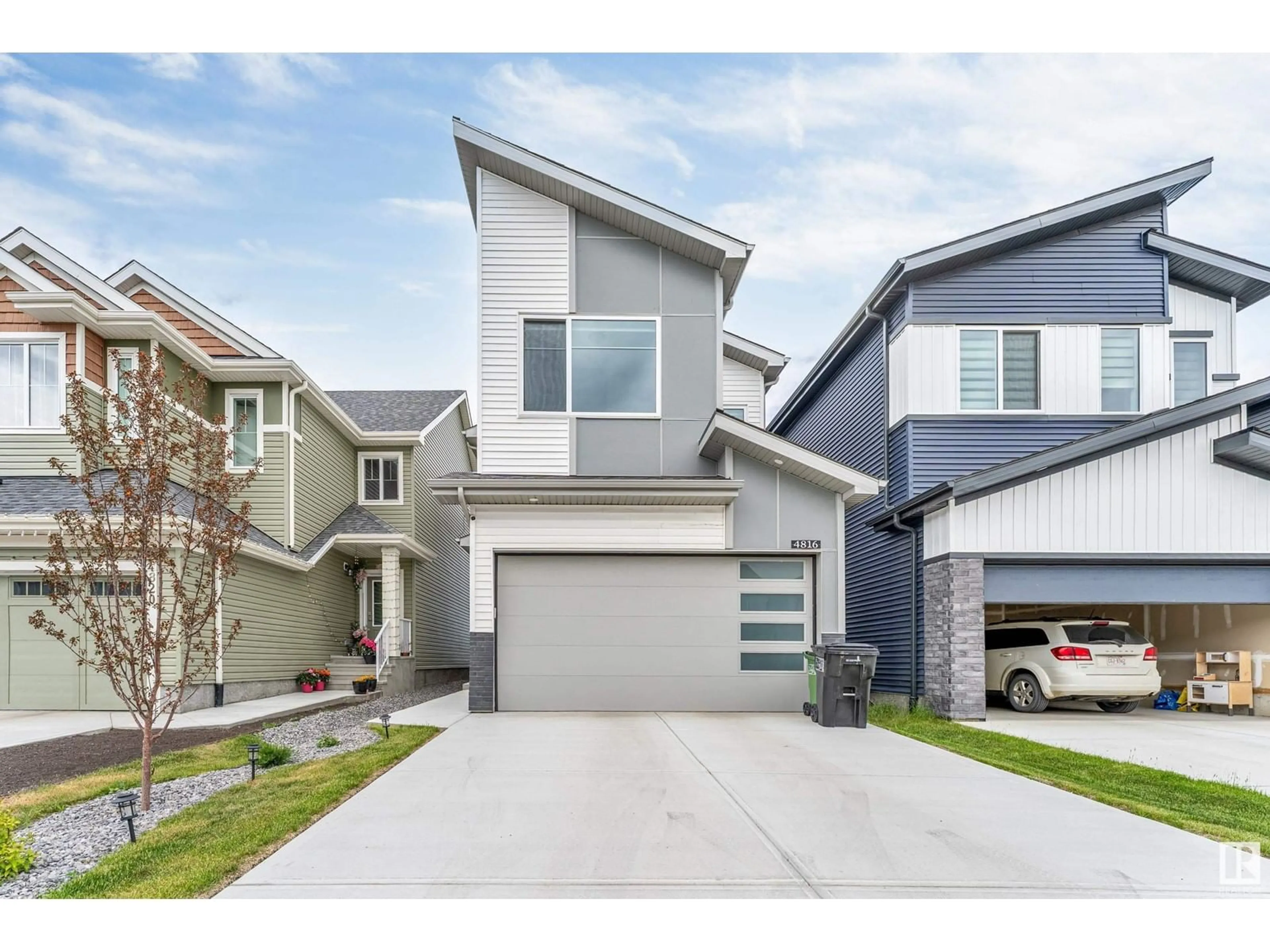 Home with vinyl exterior material, street for NW - 4816 177 AV, Edmonton Alberta T5Y3Y1