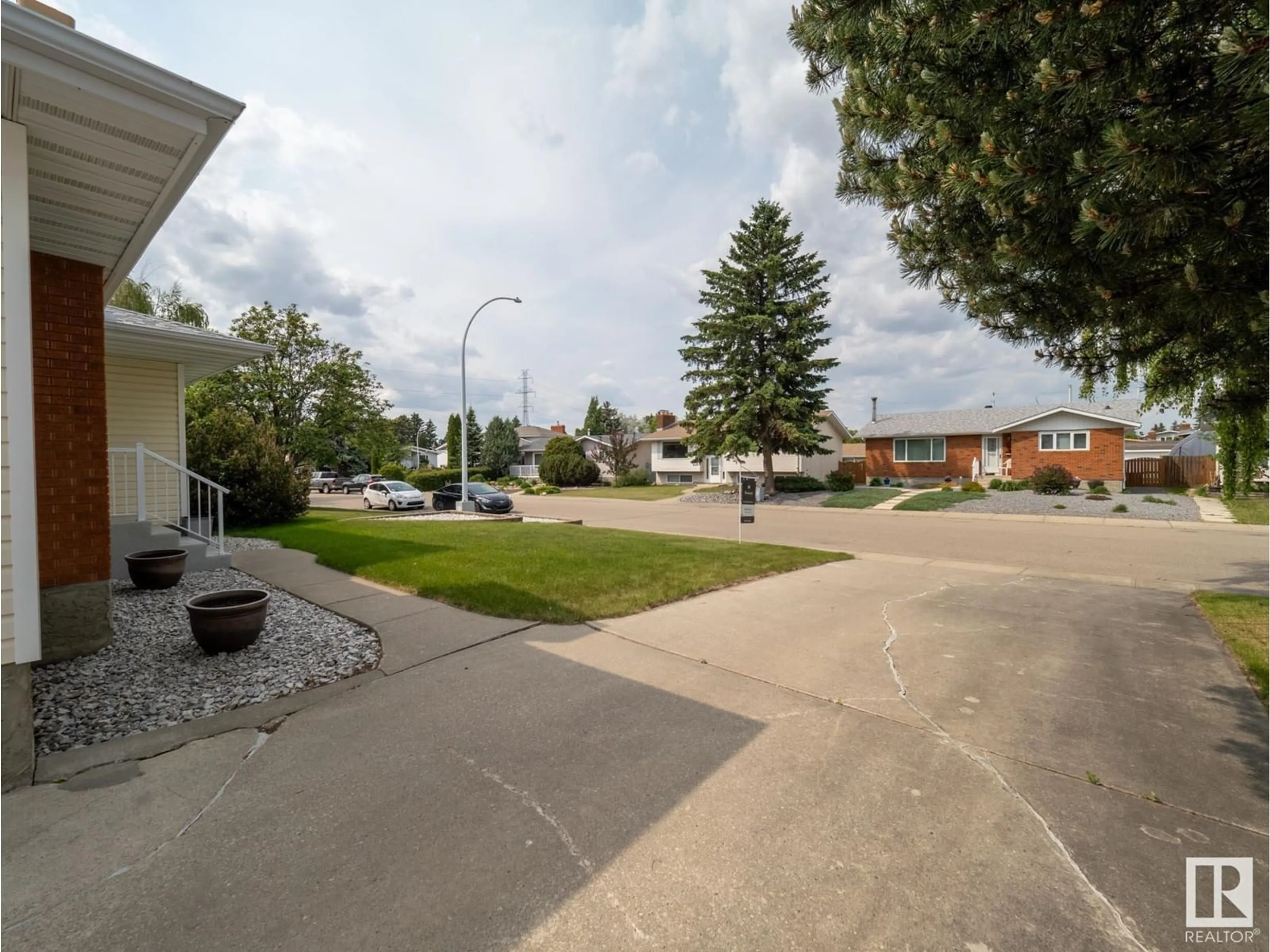 A pic from outside/outdoor area/front of a property/back of a property/a pic from drone, street for 8707 16 AV, Edmonton Alberta T6K2A4