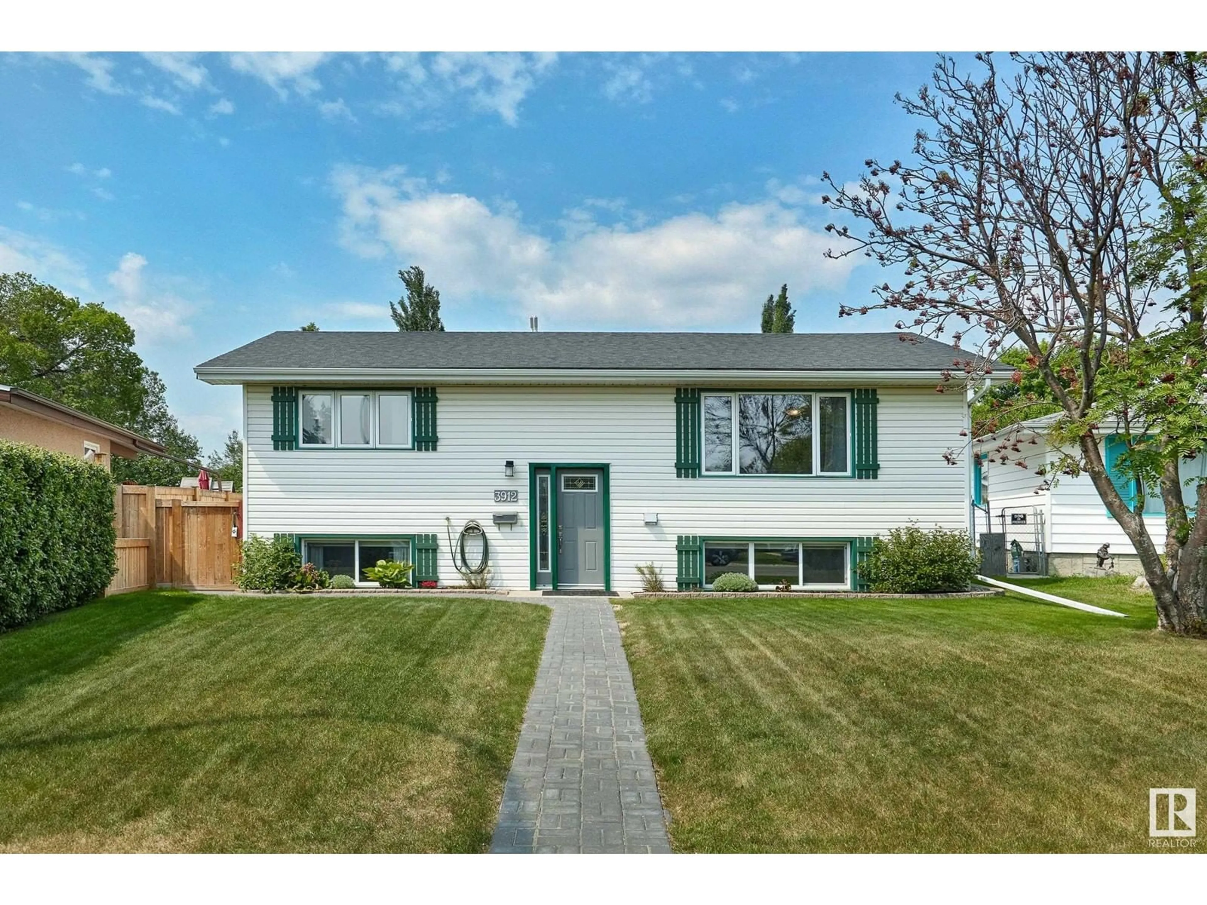 Home with vinyl exterior material, street for NW - 3912 115A ST, Edmonton Alberta T6J1R1