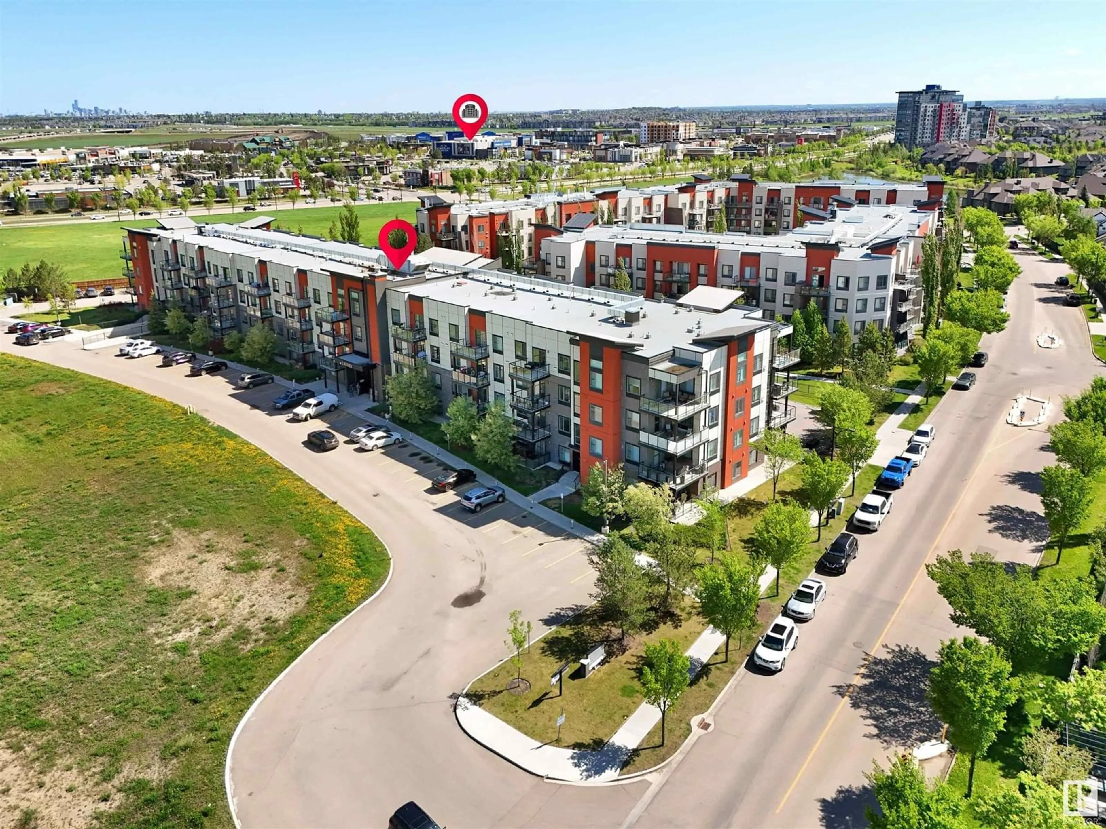A pic from outside/outdoor area/front of a property/back of a property/a pic from drone, street for #304 - 320 AMBLESIDE LINK, Edmonton Alberta T6W2Z9