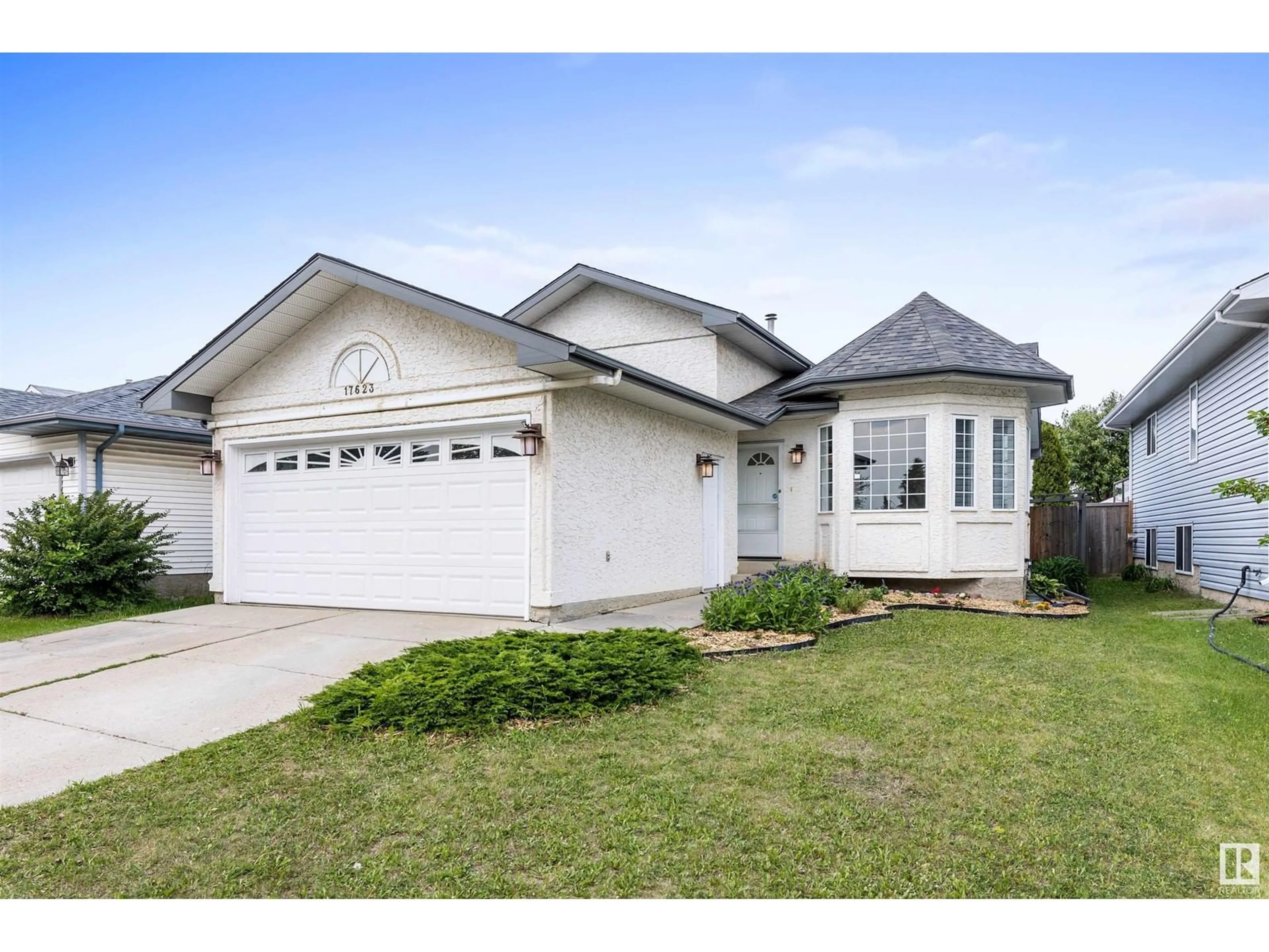 Home with vinyl exterior material, street for 17623 91 ST, Edmonton Alberta T5Z2L4