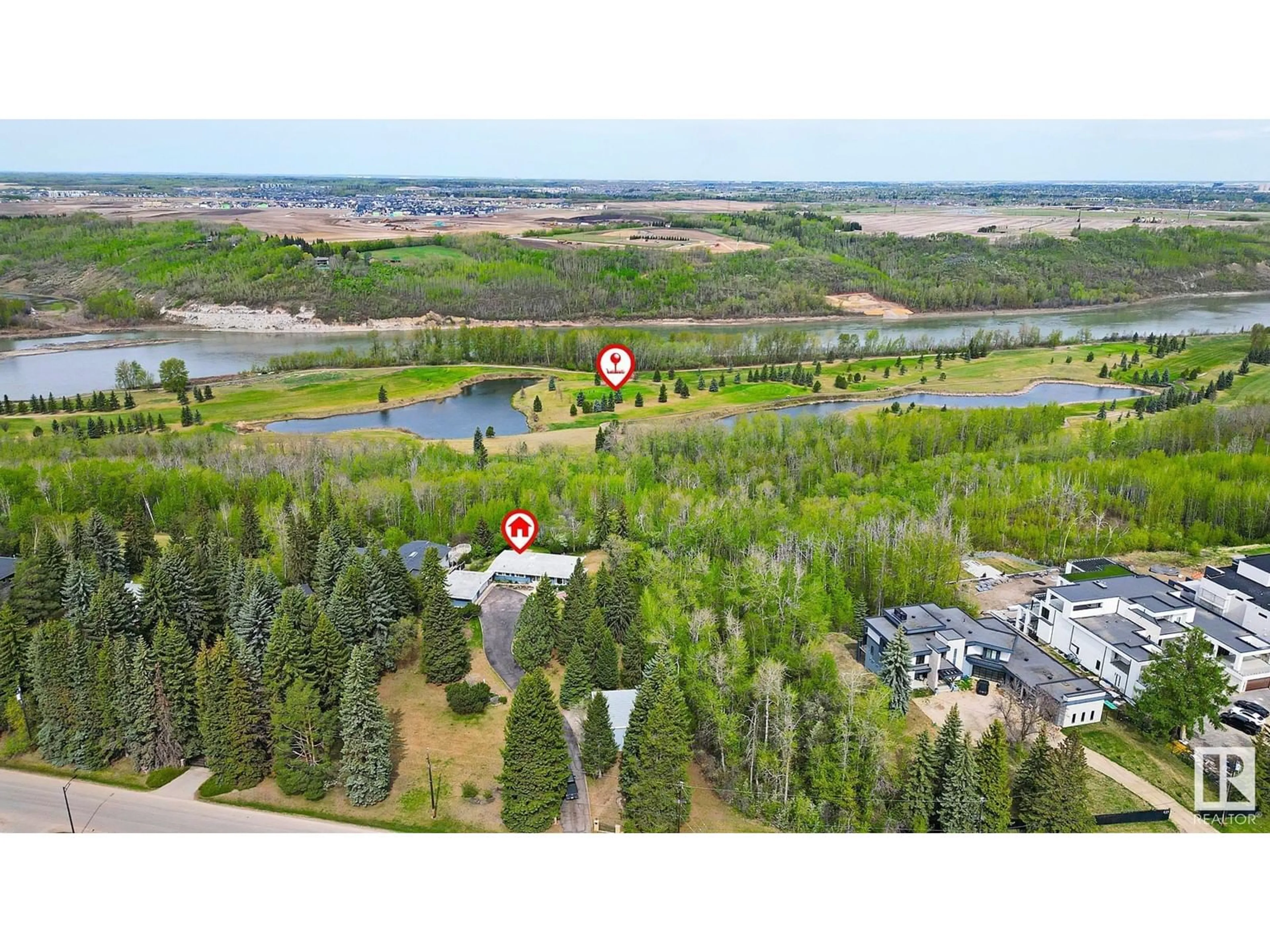 A pic from outside/outdoor area/front of a property/back of a property/a pic from drone, water/lake/river/ocean view for 140 WINDERMERE DR, Edmonton Alberta T6W0S4