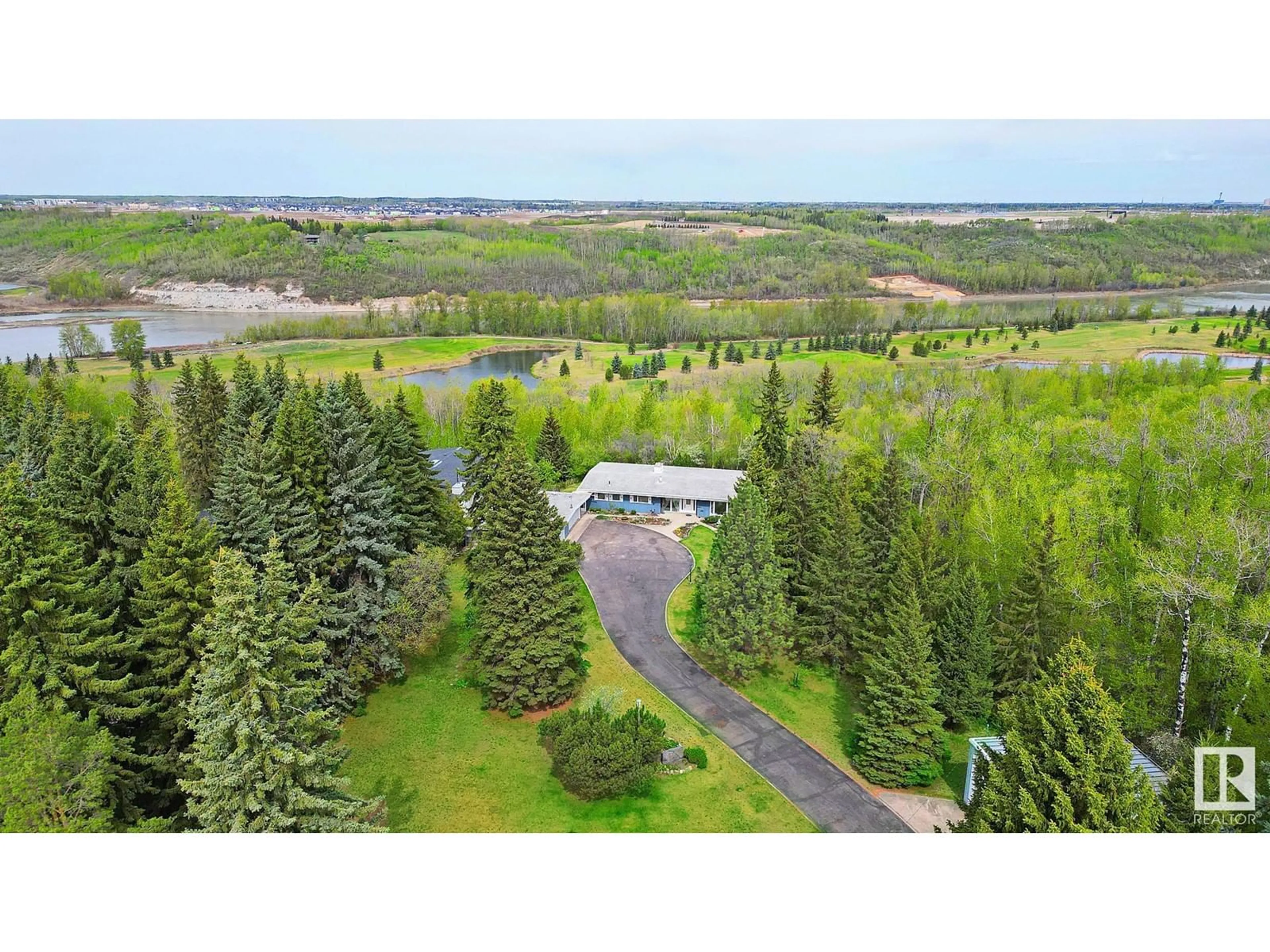 A pic from outside/outdoor area/front of a property/back of a property/a pic from drone, forest/trees view for 140 WINDERMERE DR, Edmonton Alberta T6W0S4