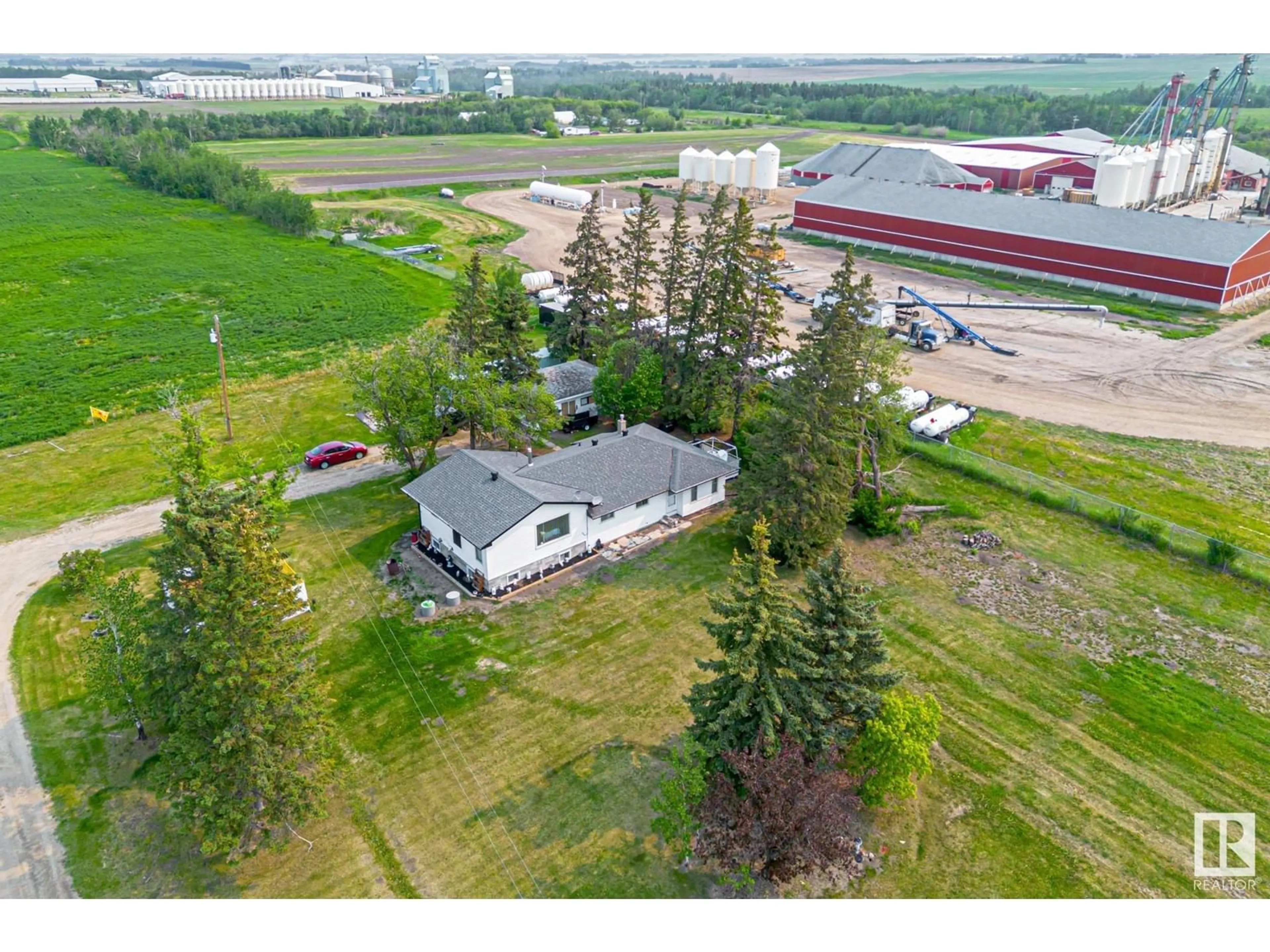 A pic from outside/outdoor area/front of a property/back of a property/a pic from drone, building for 25218 SH 651, Rural Sturgeon County Alberta T0G1L2
